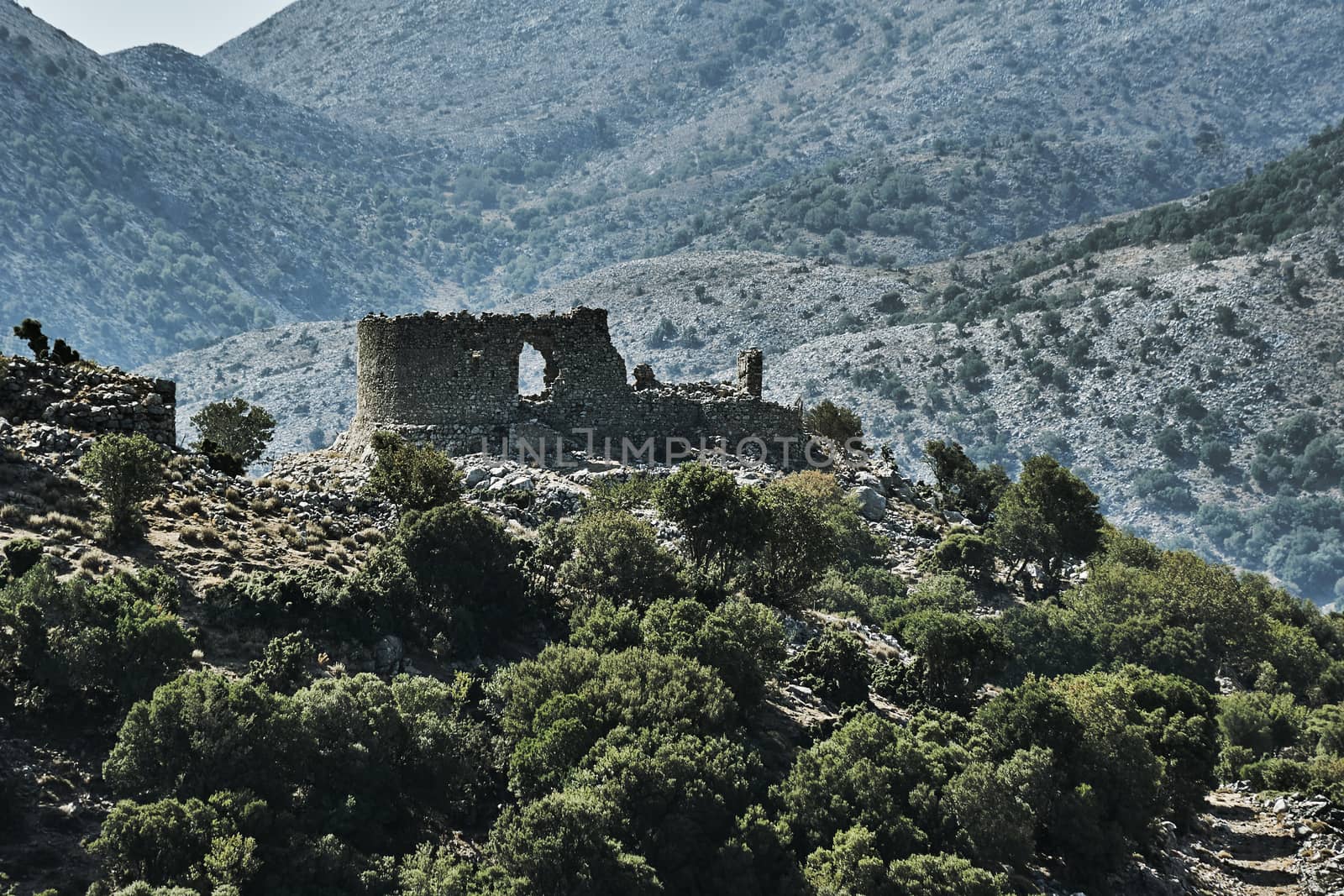 The ruins of the Venetian fortress in mountains, Crete