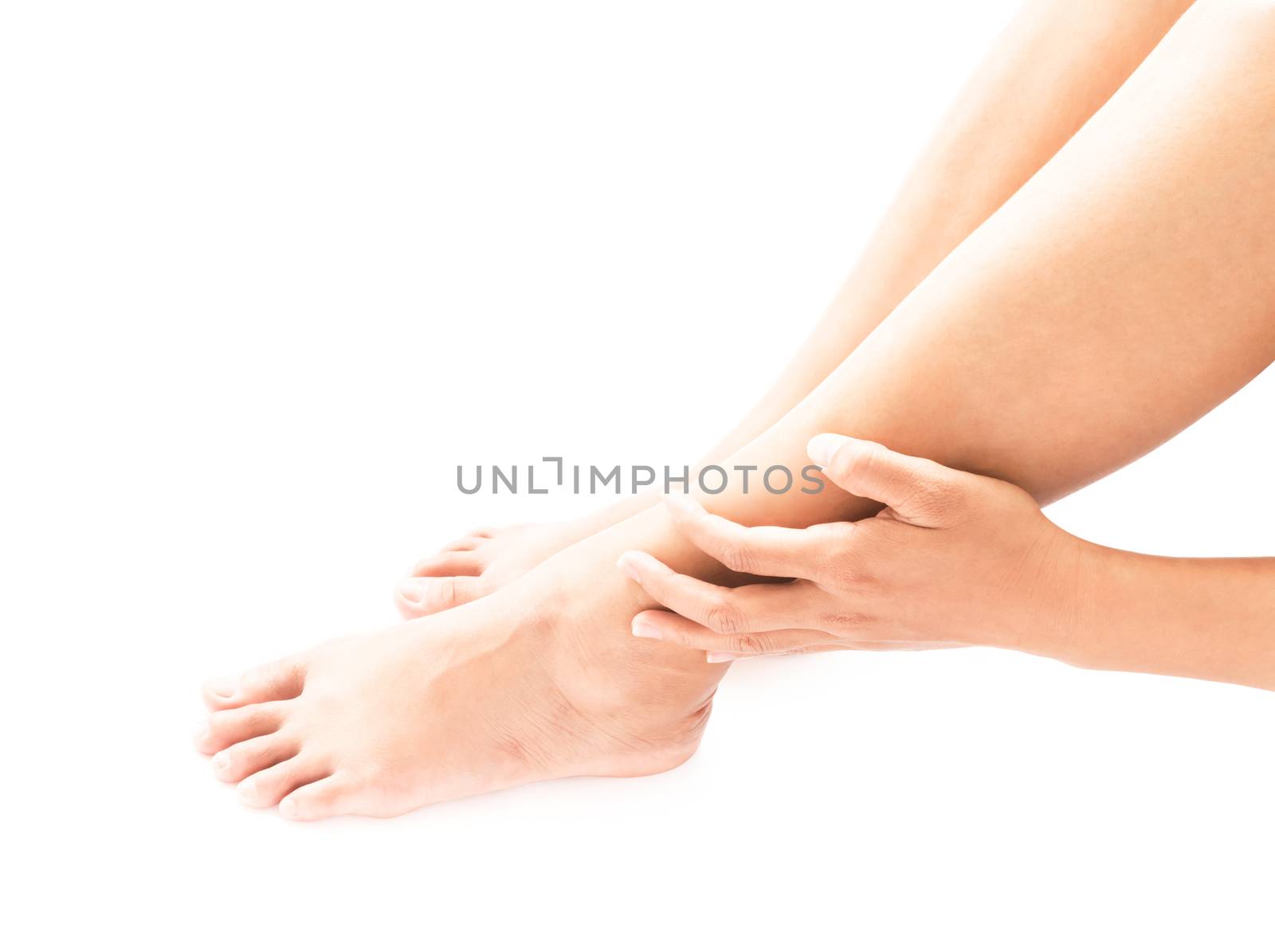 Closeup woman hand hold legs with pain symptom, health care and medical concept