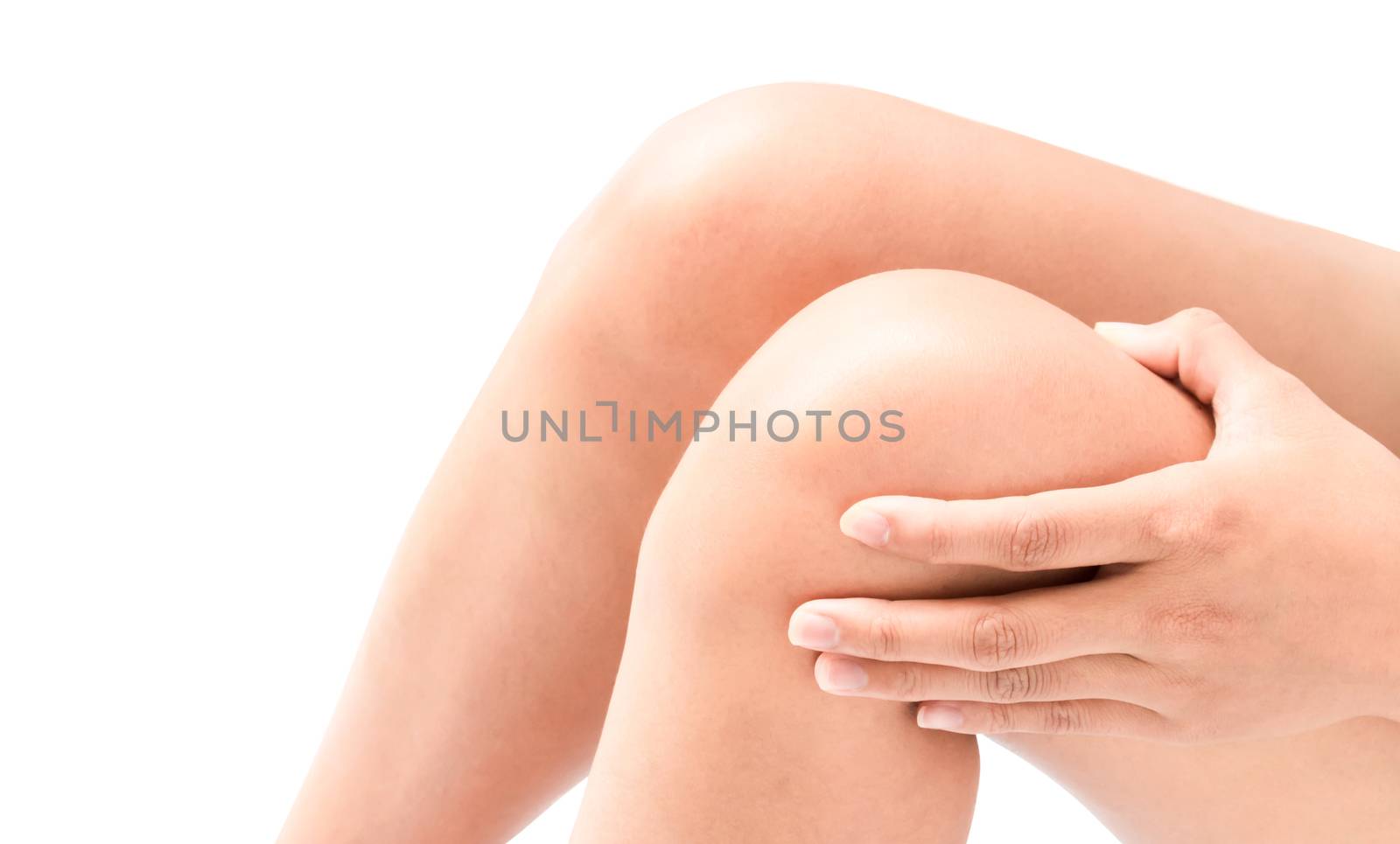 Closeup woman hand hold knee with pain symptom, health care by pt.pongsak@gmail.com