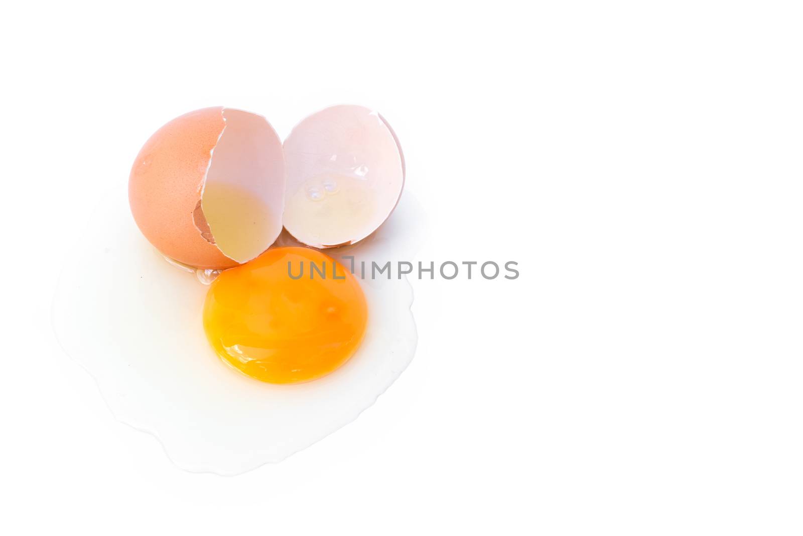 Broken egg on white background, raw material for make cooking