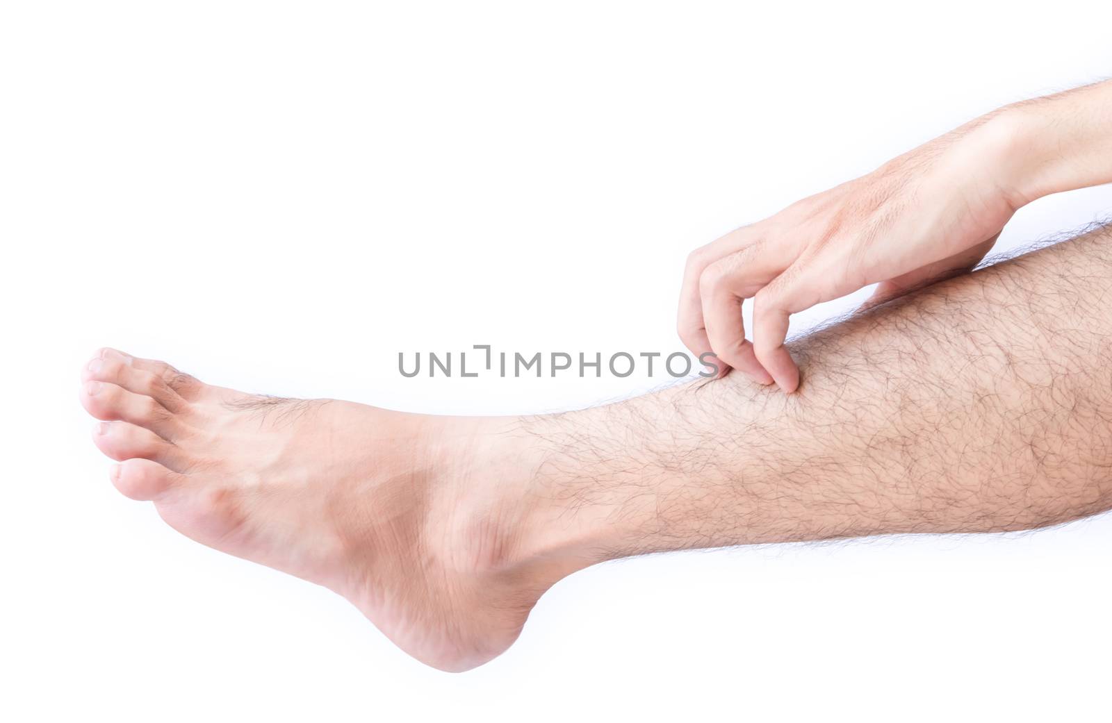 Woman hand scratching on feet with white background for healthy concept