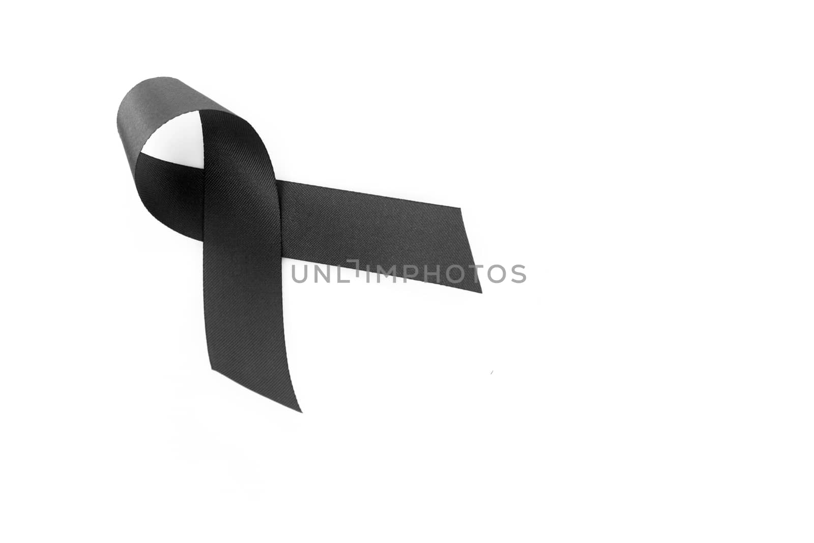 Black ribbon symbol for mourning on white background by pt.pongsak@gmail.com