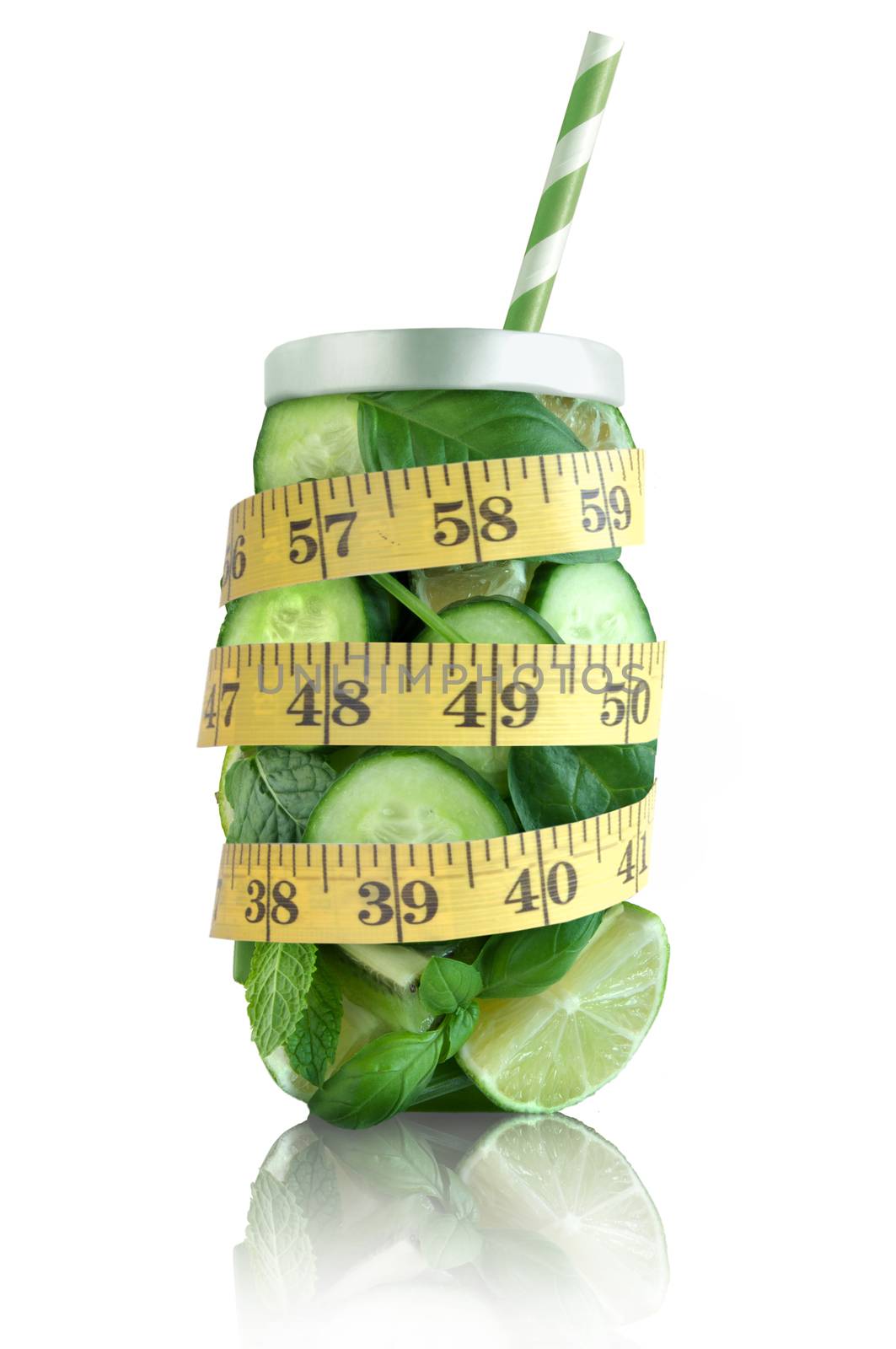 Healthy green fruits and vegetable in the shape of a jar with tape measure 