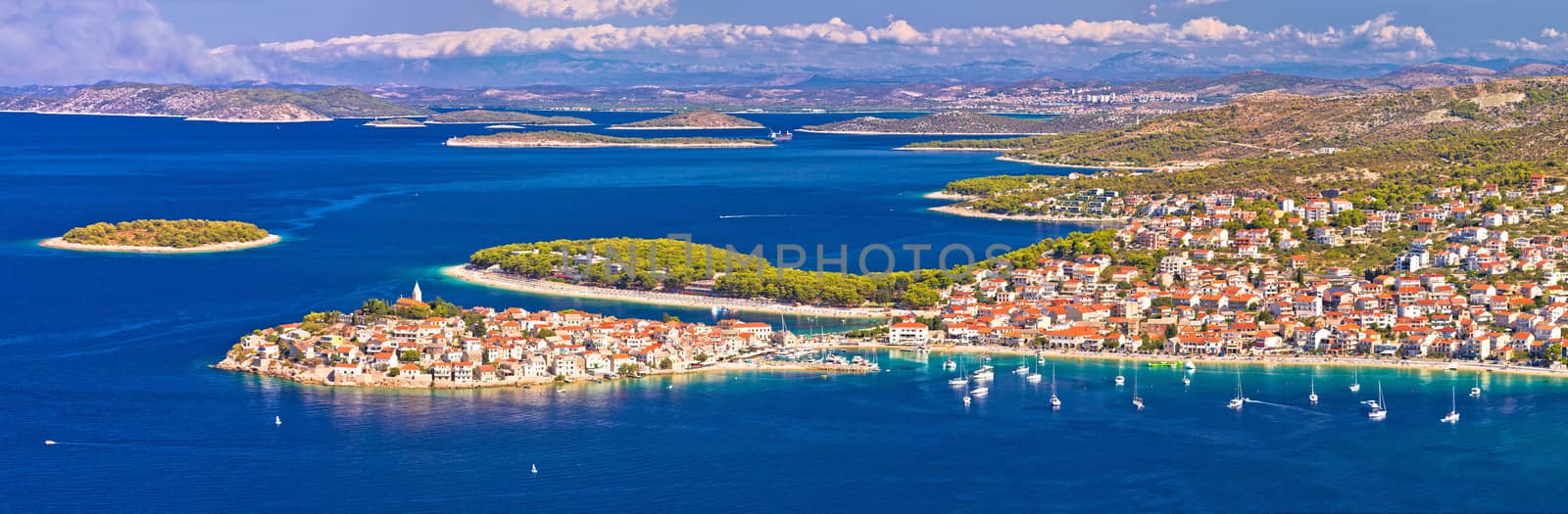 Adriatic tourist destination of Primosten aerial panoramic archipelago view, with cruiser ship, Dalmatia, Croatia