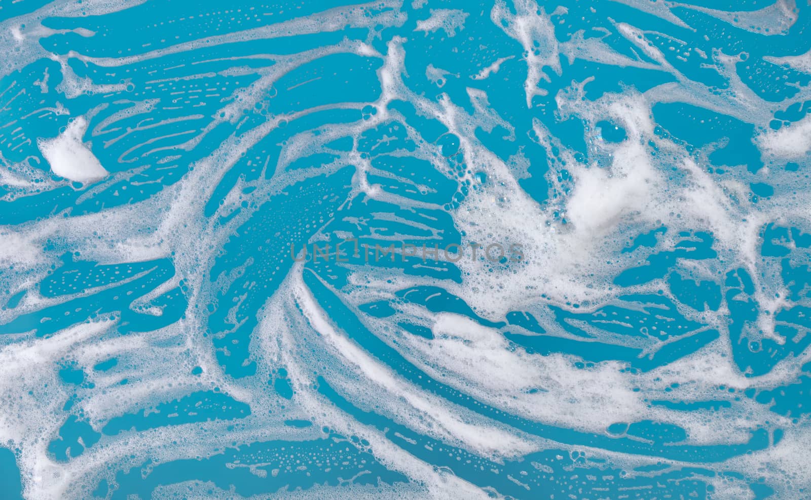 abstract background, soap foam on a blue background