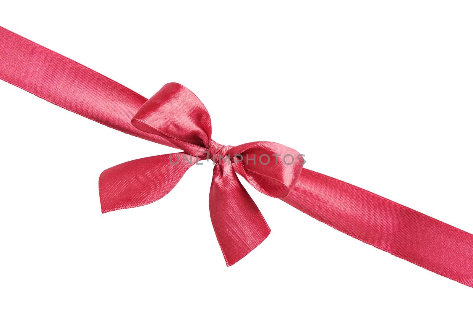 Red silk gift bow on the diagonally red silk ribbon isolated on a white background