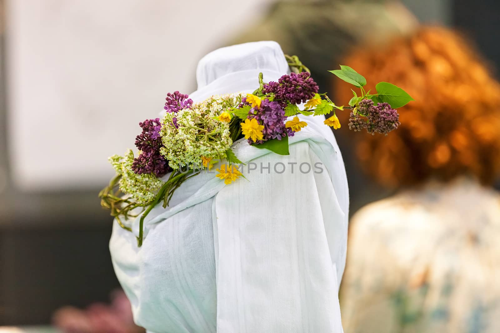 traditional costum with decoration of flowers, note shallow depth of field