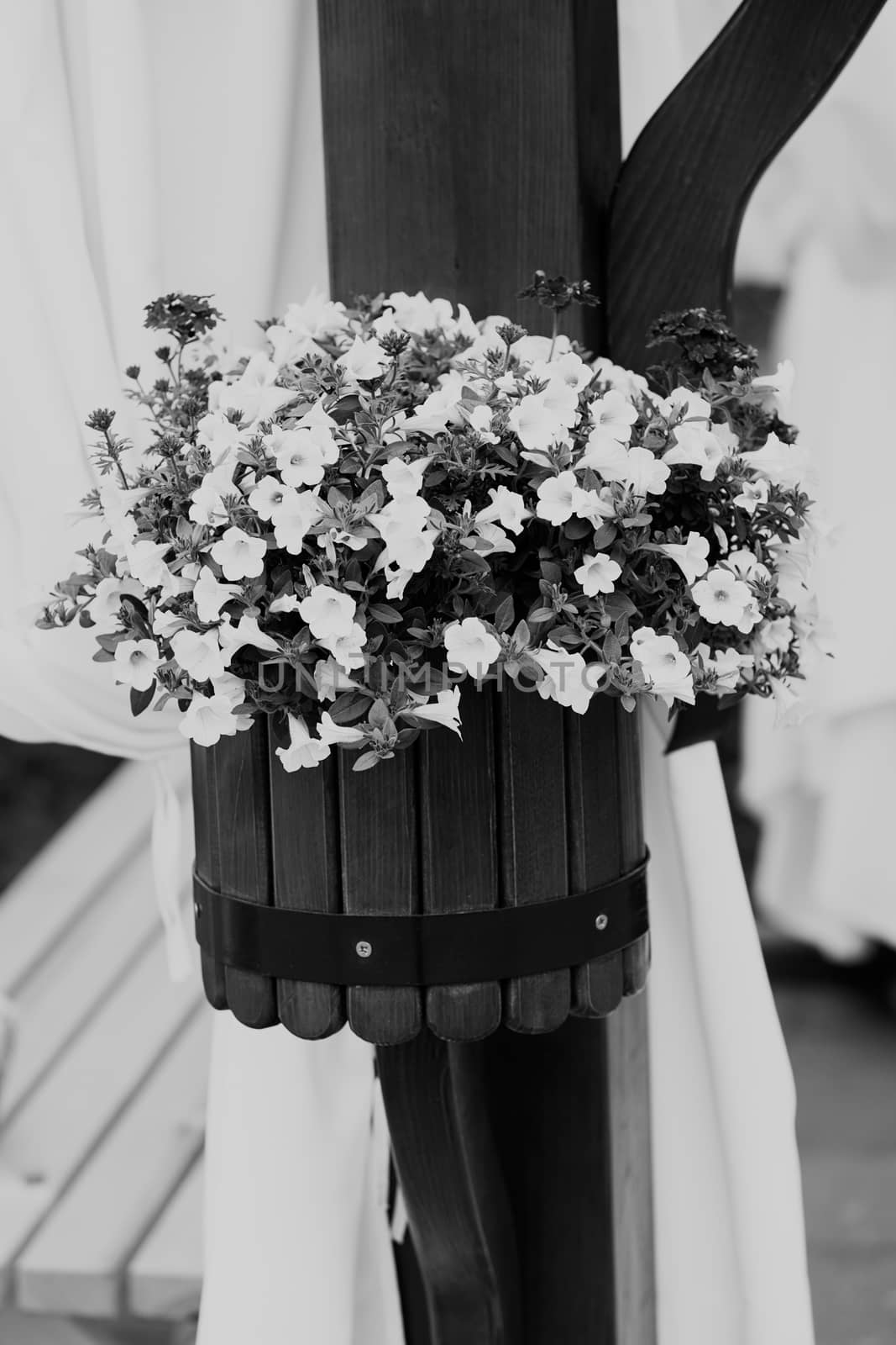 Hanging wooden flower arrangement at the entrance, note shallow depth of field