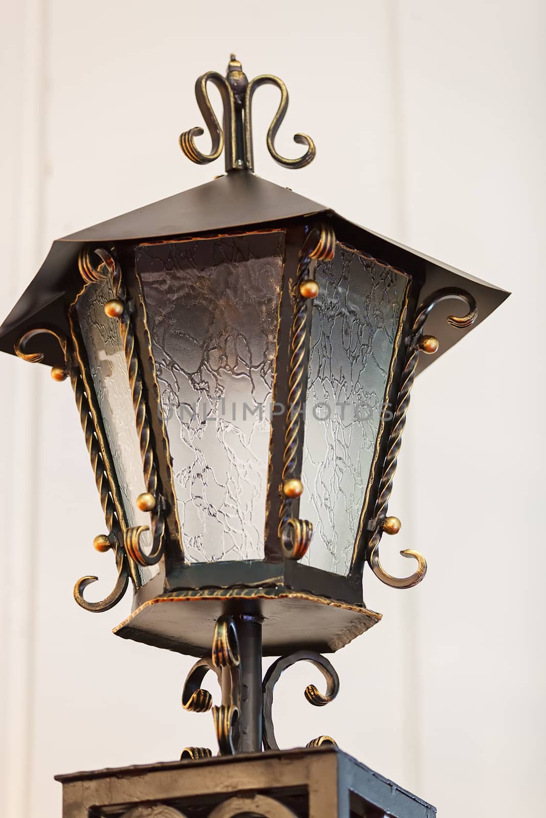 Decorative antique lantern made of wrought iron, note shallow depth of field