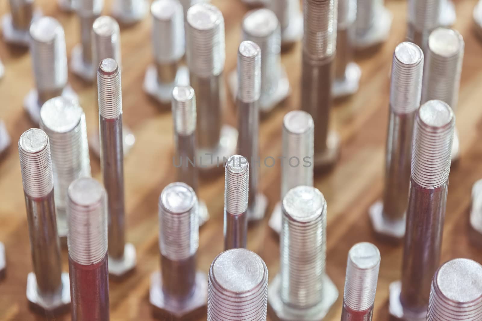 screws, nuts, clamps ...on the glass, note shallow depth of field