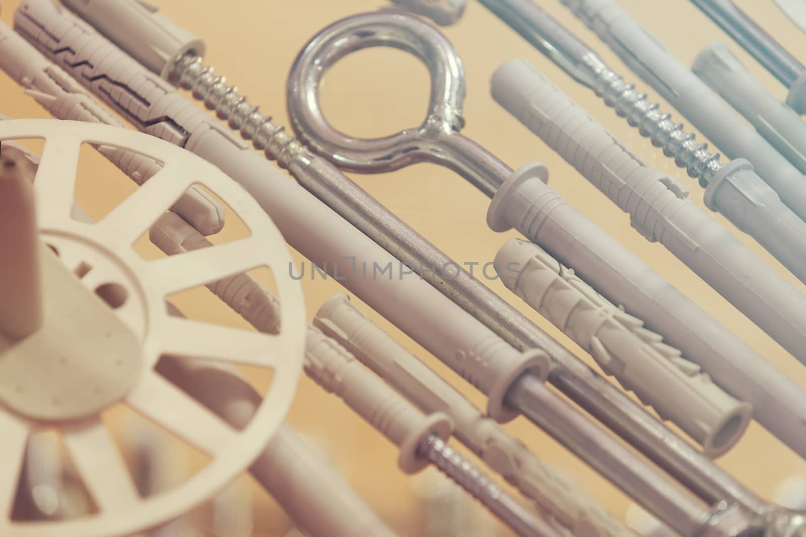 screws, nuts, clamps ...on the glass, note shallow depth of field