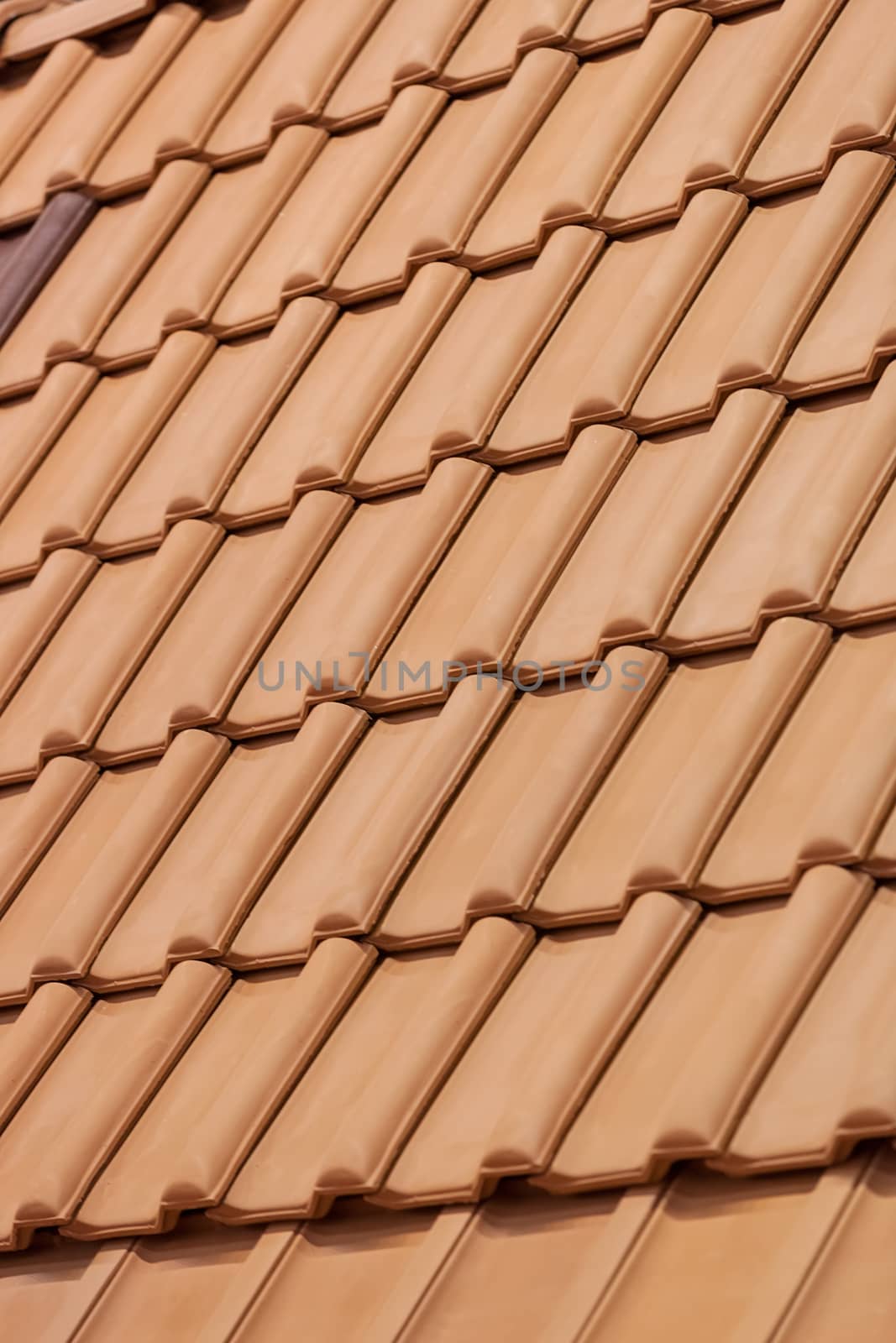 types of red tiles for roof  to cover the house, note shallow depth of field