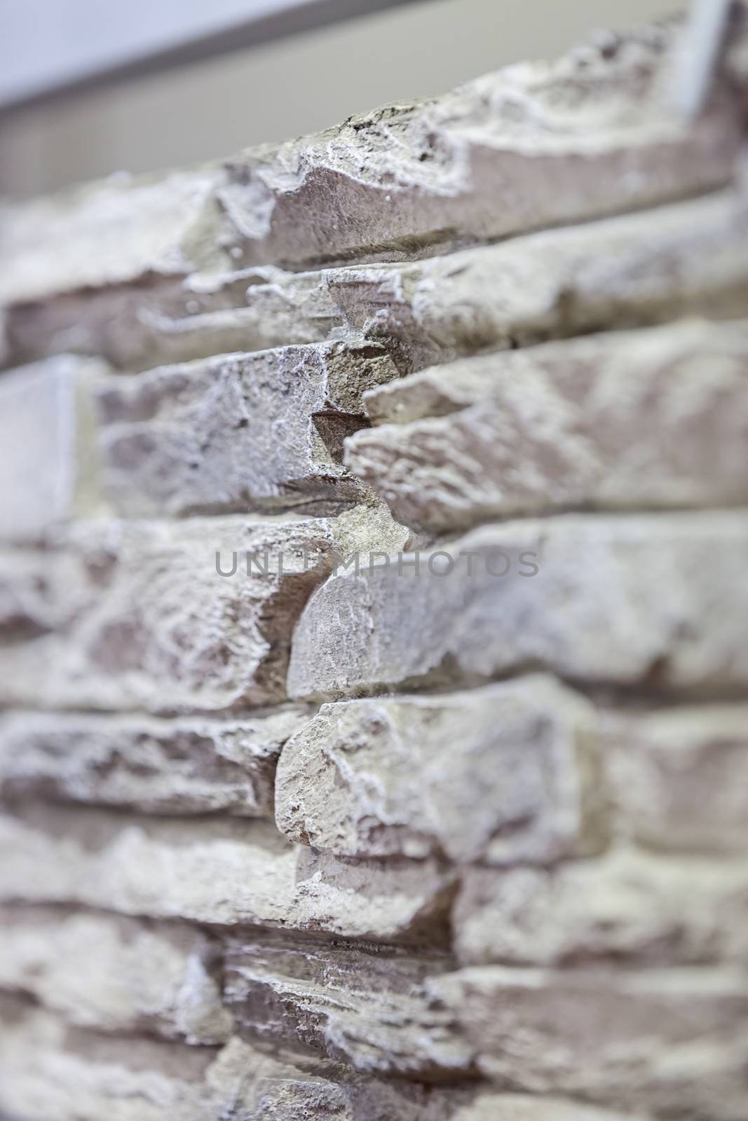 a part of new stone wall, note shallow depth of field
