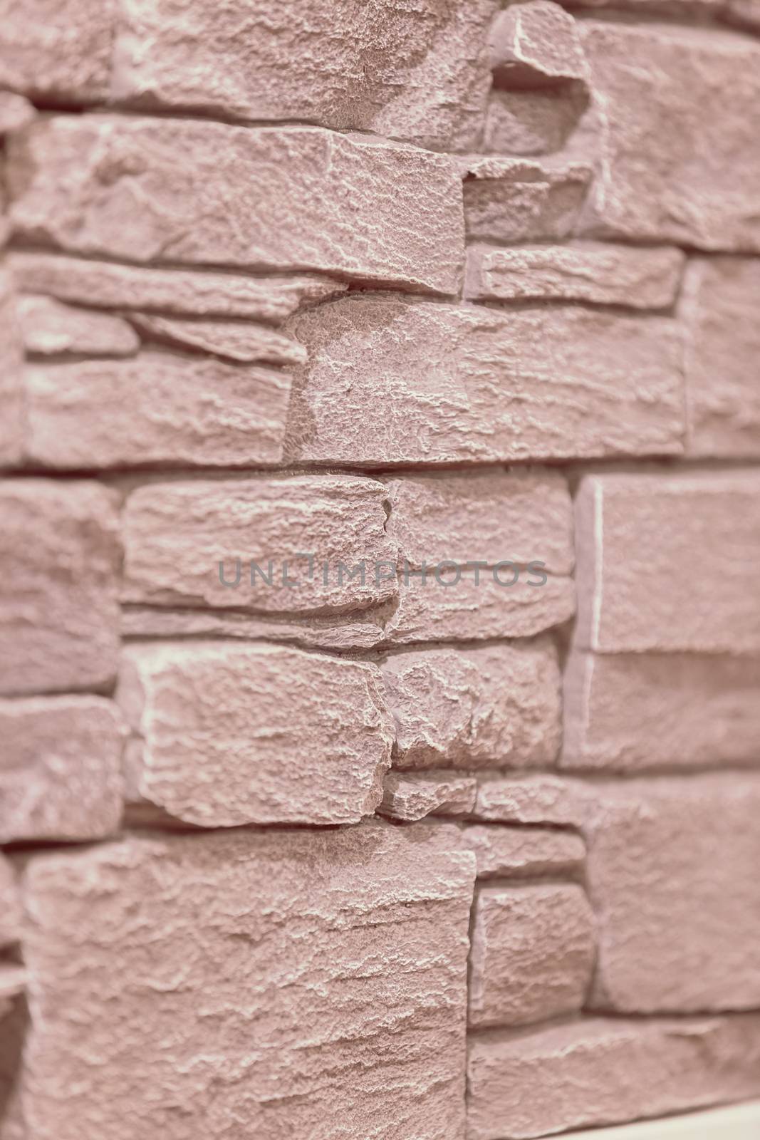 a part of new stone wall, note shallow depth of field