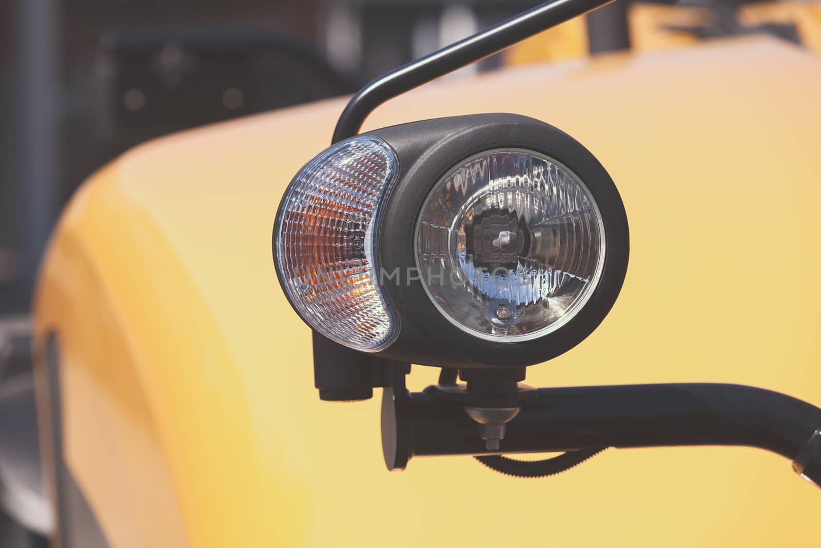 type headlights of the machine, note shallow depth of field