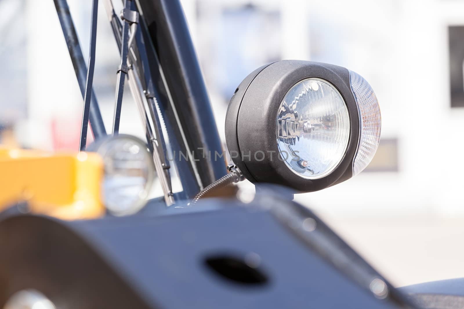 type headlights of the machine, note shallow depth of field