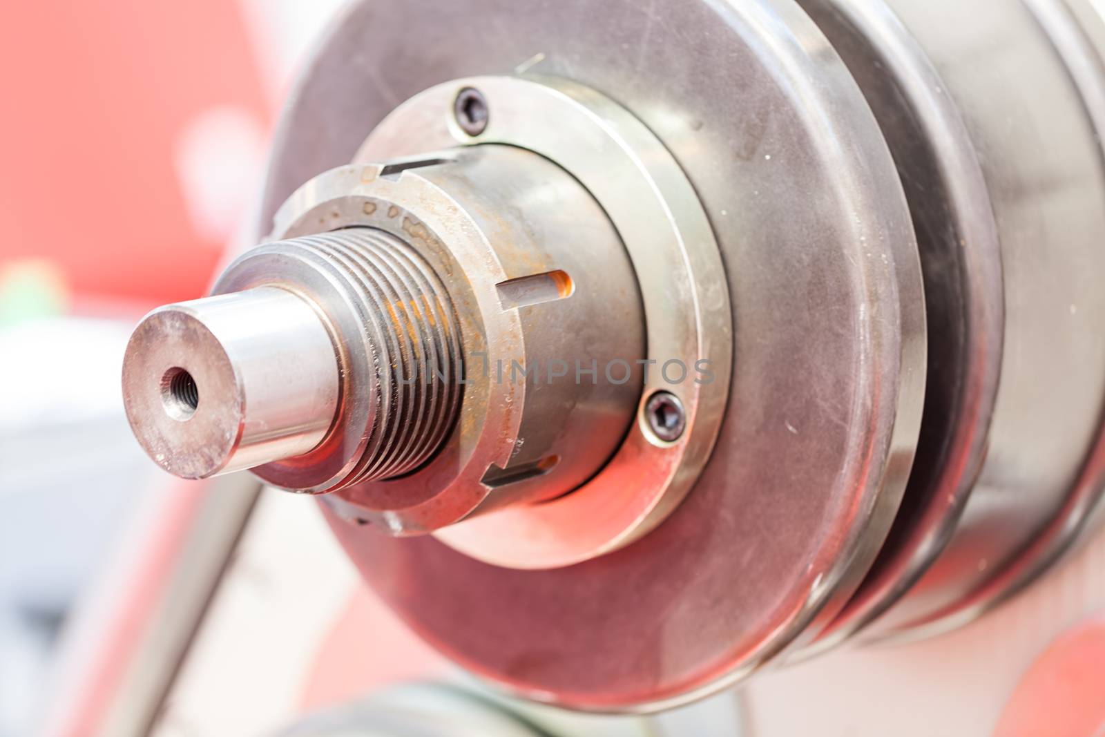 part of metal processing machines , note shallow depth of field