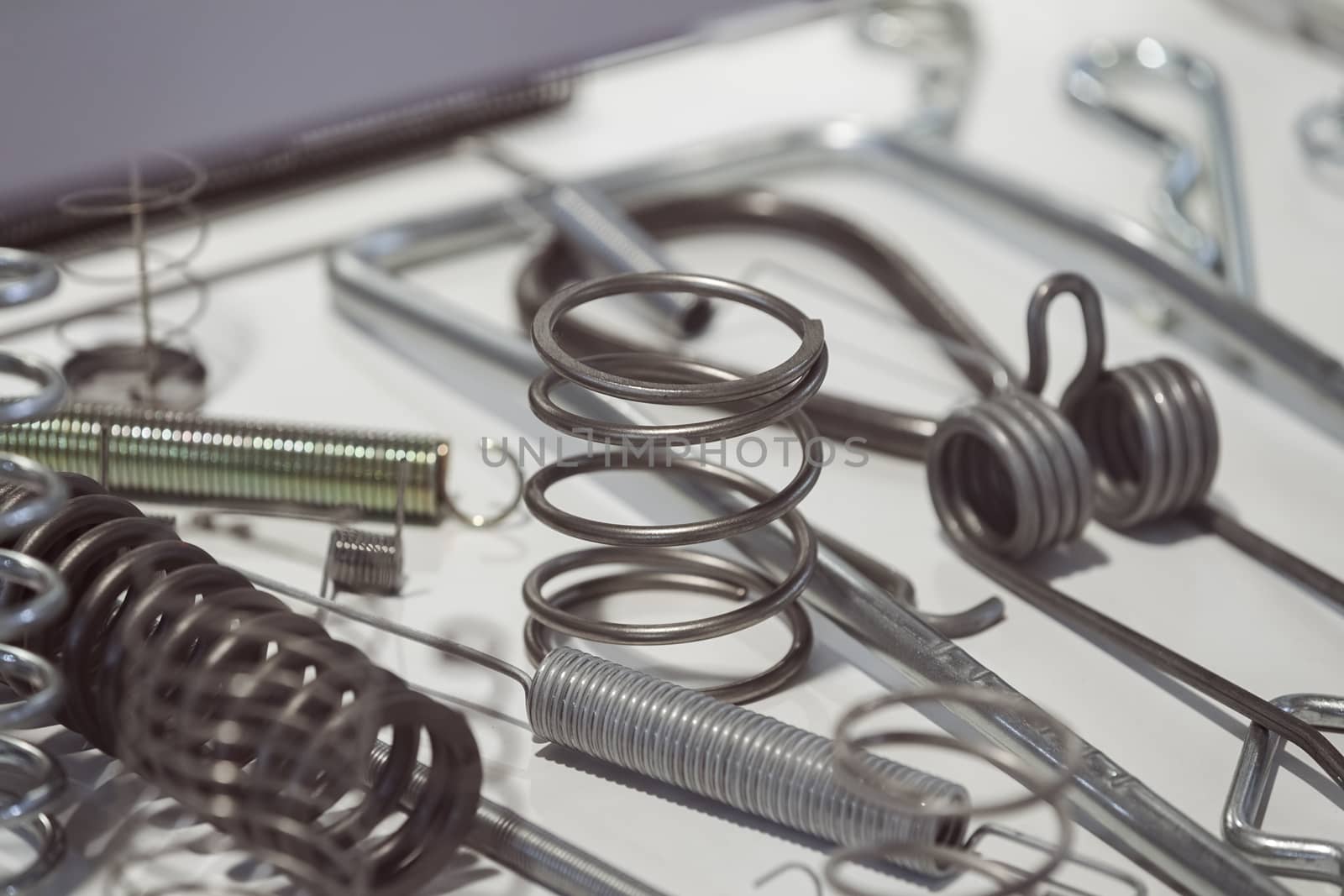 Various metal springs for different purposes, note shallow depth of field