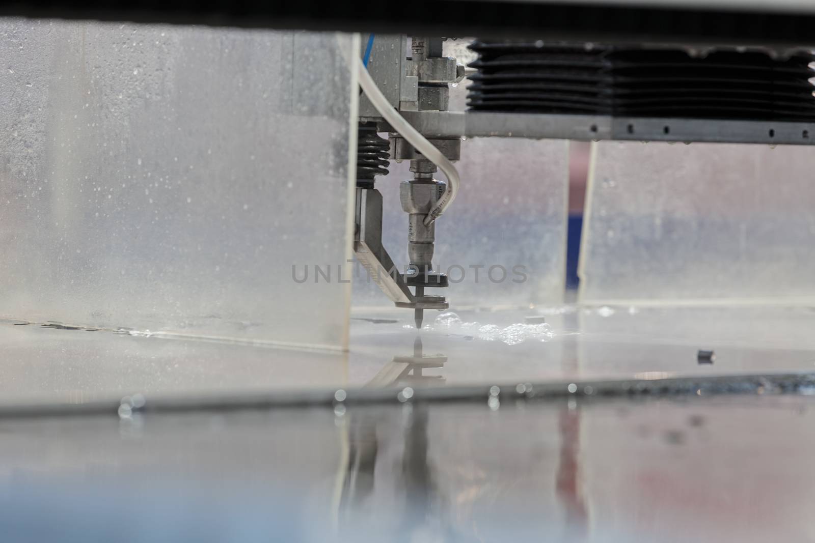 cnc water jet machine for  metalworking, note shallow depth of field