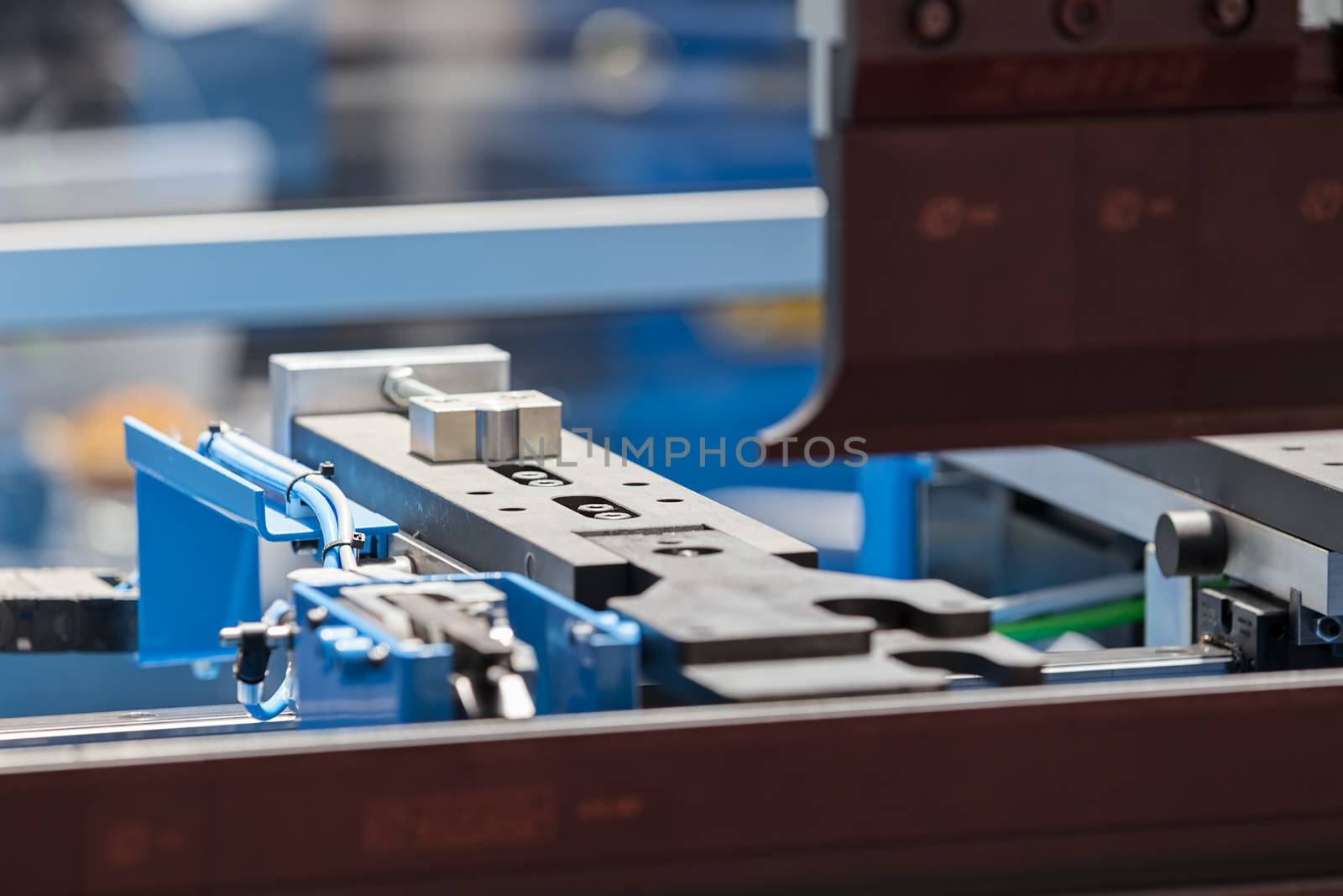 detail of hydraulic press for metalworking, note shallow depth of field