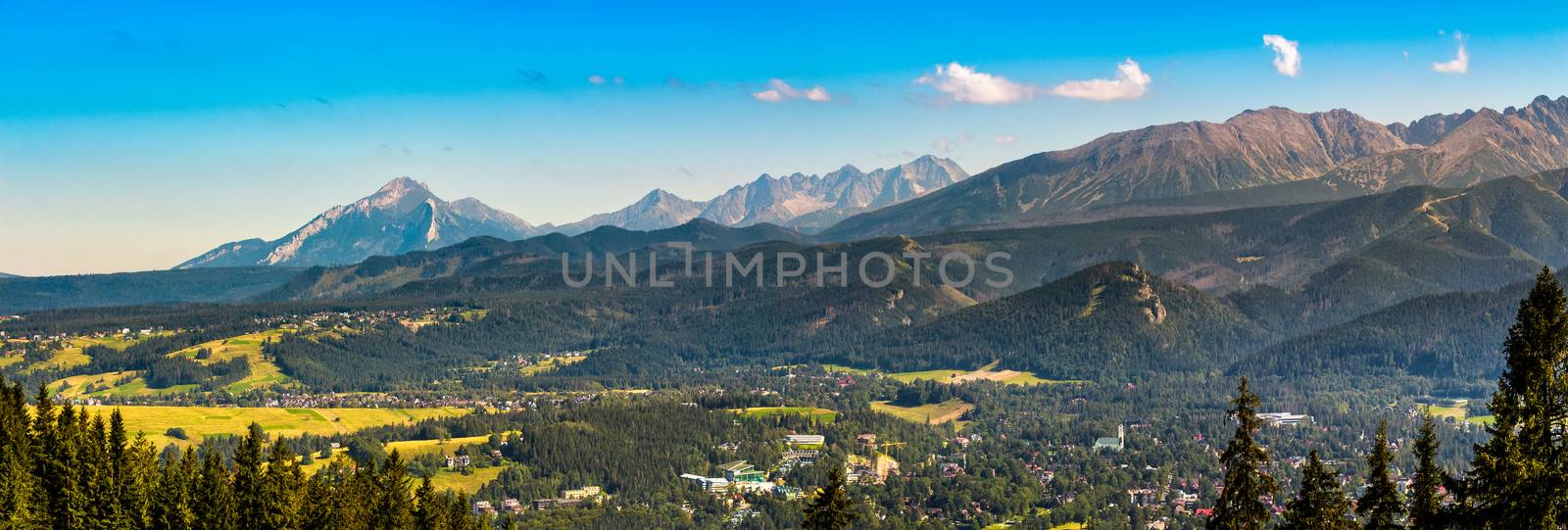 Summer panorama of High Tatra Mountain range near the village Zakopane in Poland