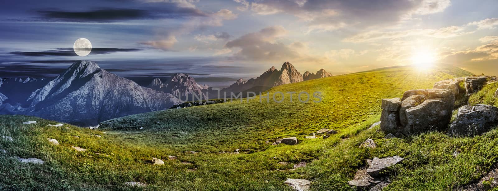 Summer landscape concept of Day and Night meet in High Tatra Mountains on a meadow with huge stones among the grass on top of the hillside near the peaks