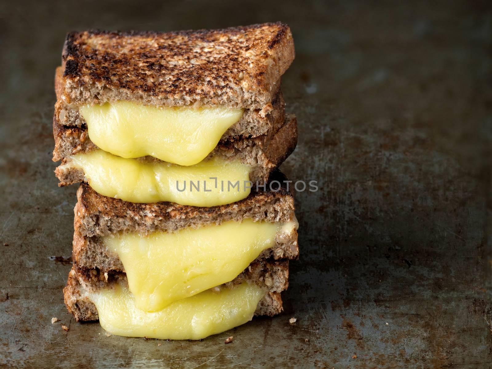 close up of rustic american grilled cheese sandwich