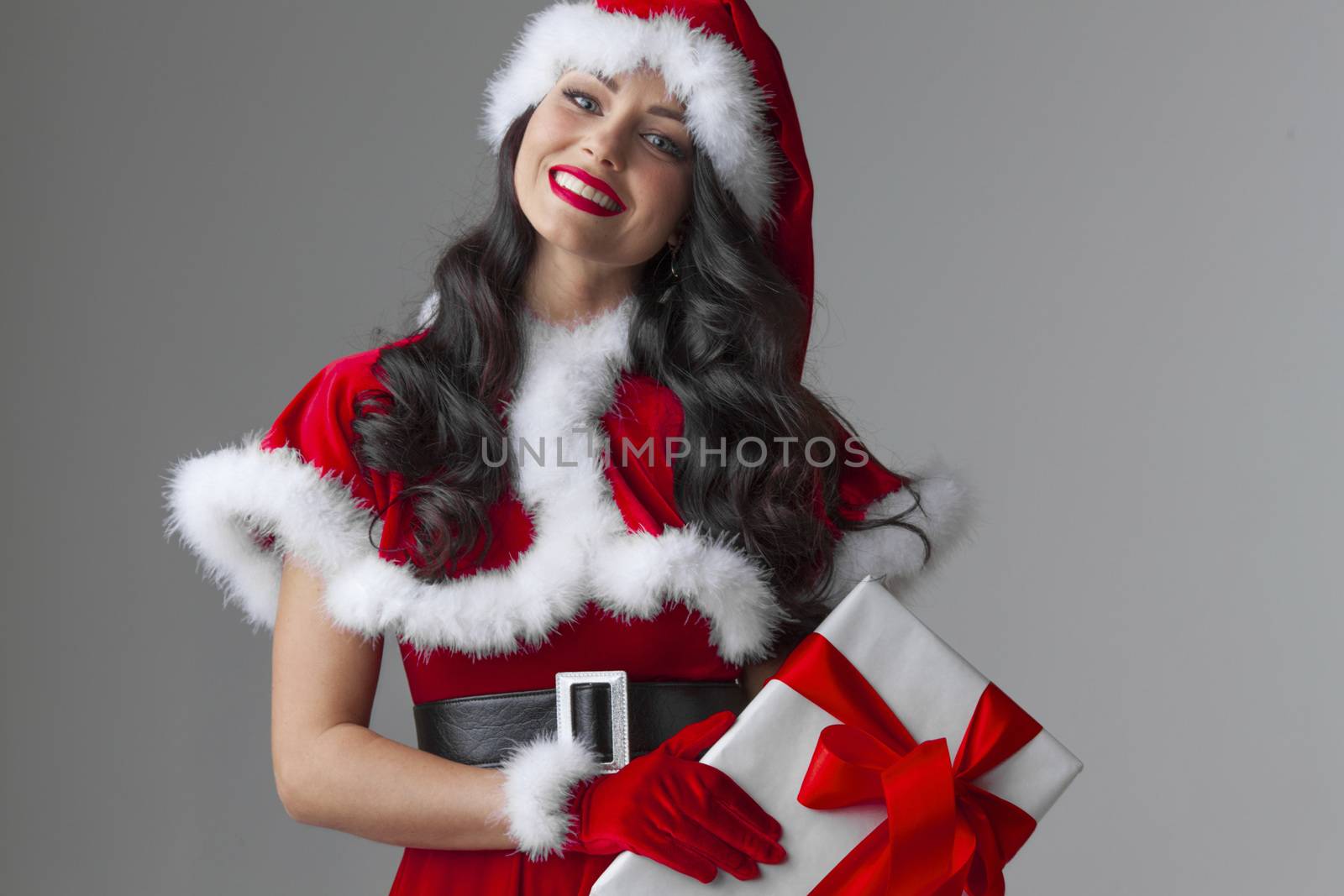 Portrait of beautiful sexy girl wearing santa claus clothes