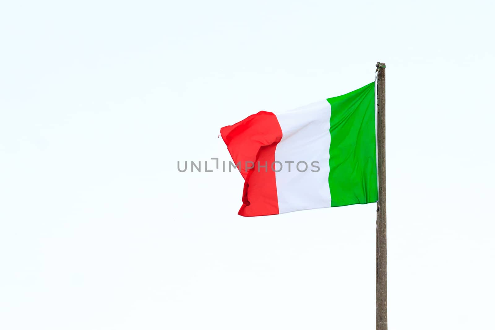An isolated italian flag waving in the wind, Italy