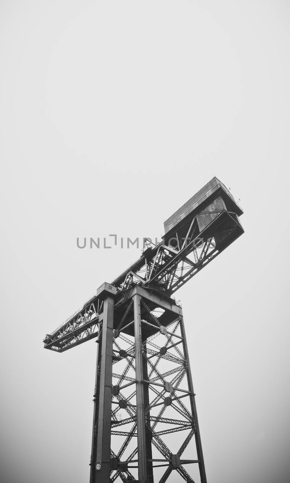 Industrial Shipbuilding Crane Against A Grey Sky With Copy Space