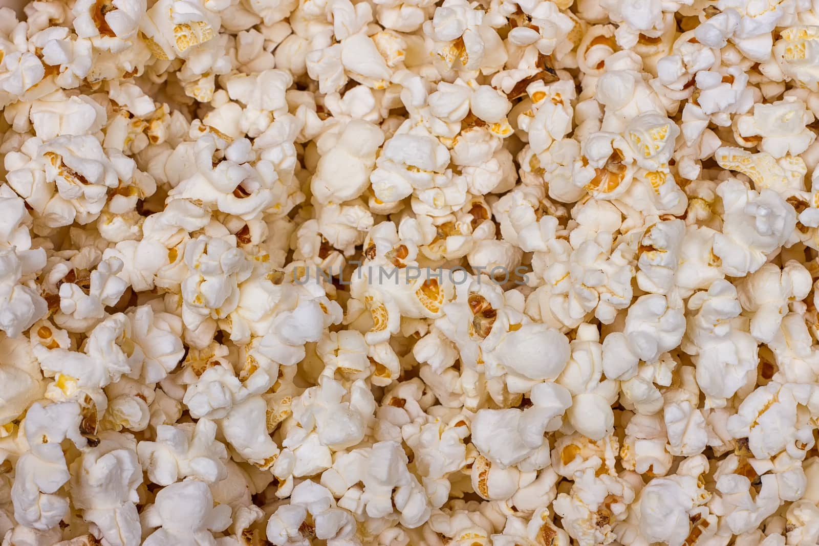 A lot of popcorn close-up. texture or background