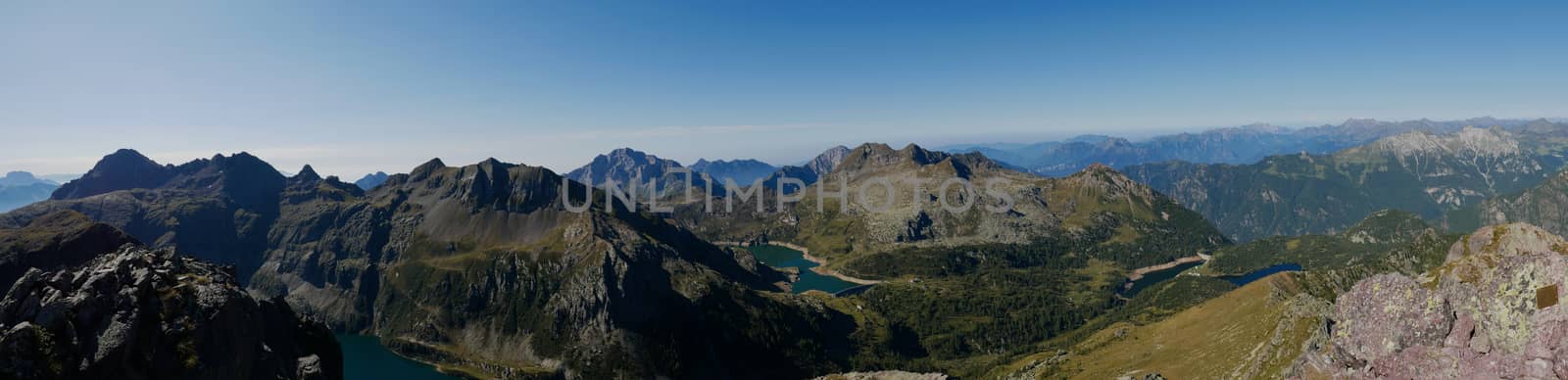 Panoramic view of lake Colombo basin and dam on the Bergamo Alps, northern Italy

