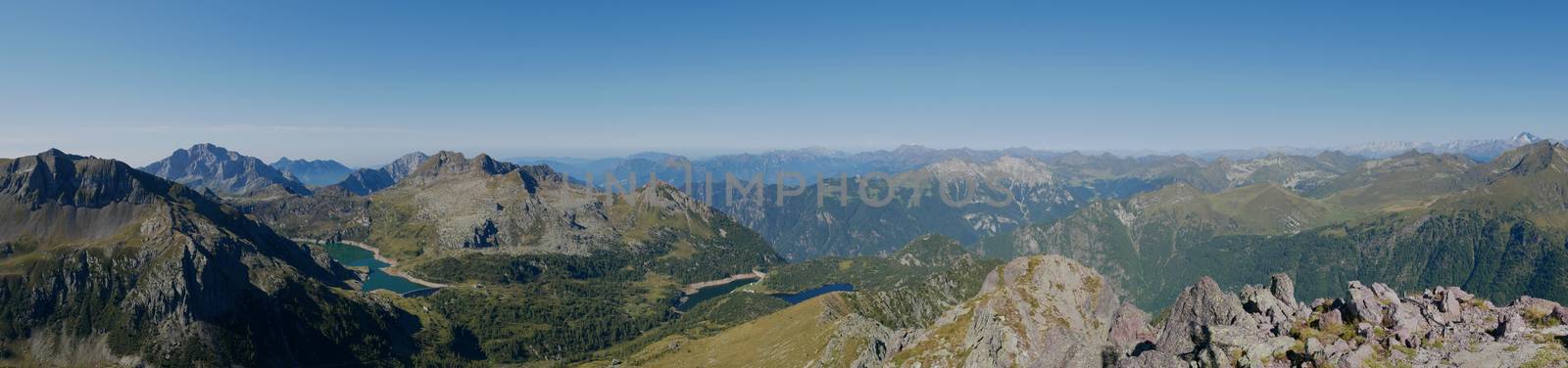 Panoramic view of lake Colombo basin and dam on the Bergamo Alps, northern Italy
