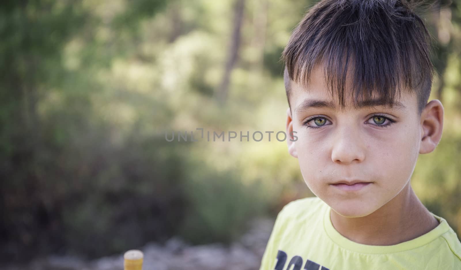 Boy with beautiful green eyes