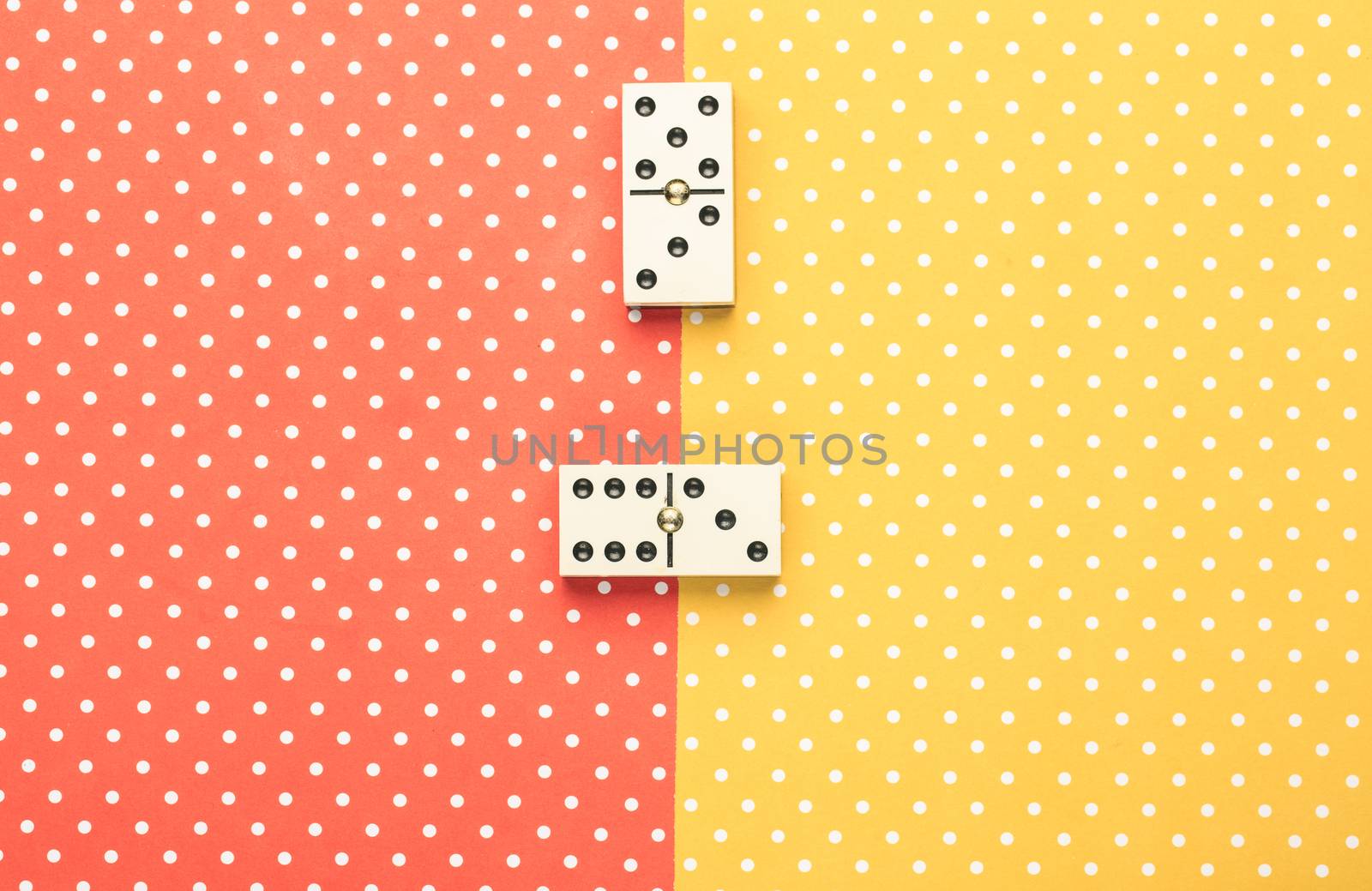 Domino pieces in a color background