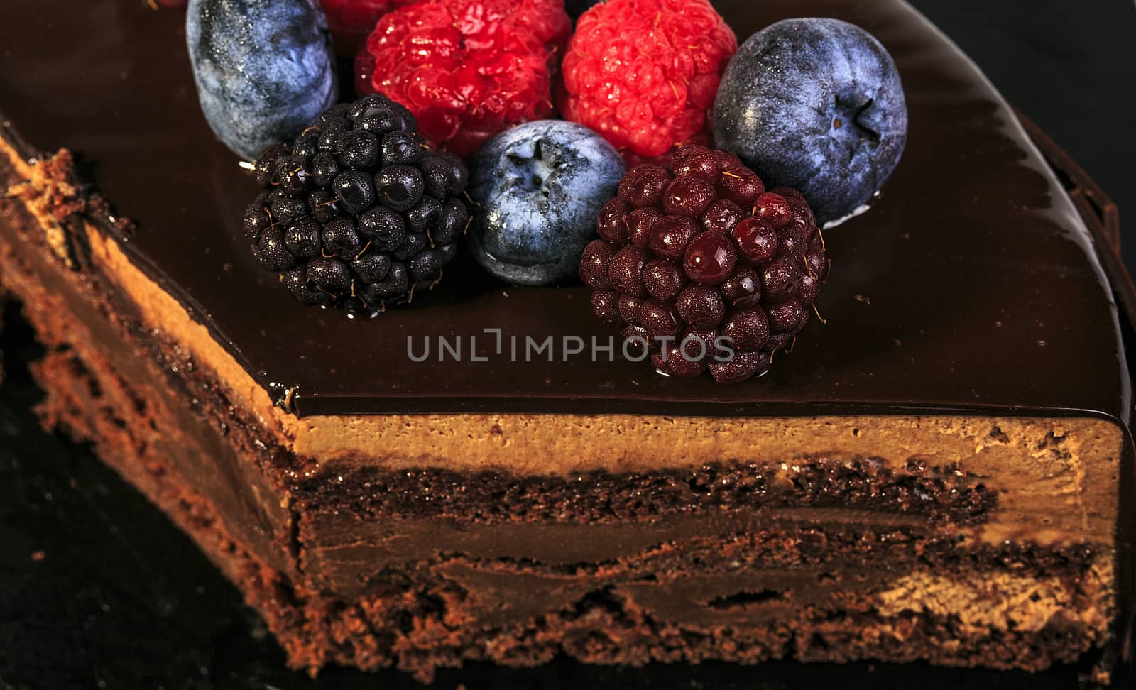 Delicious red fruits pie with chocolate