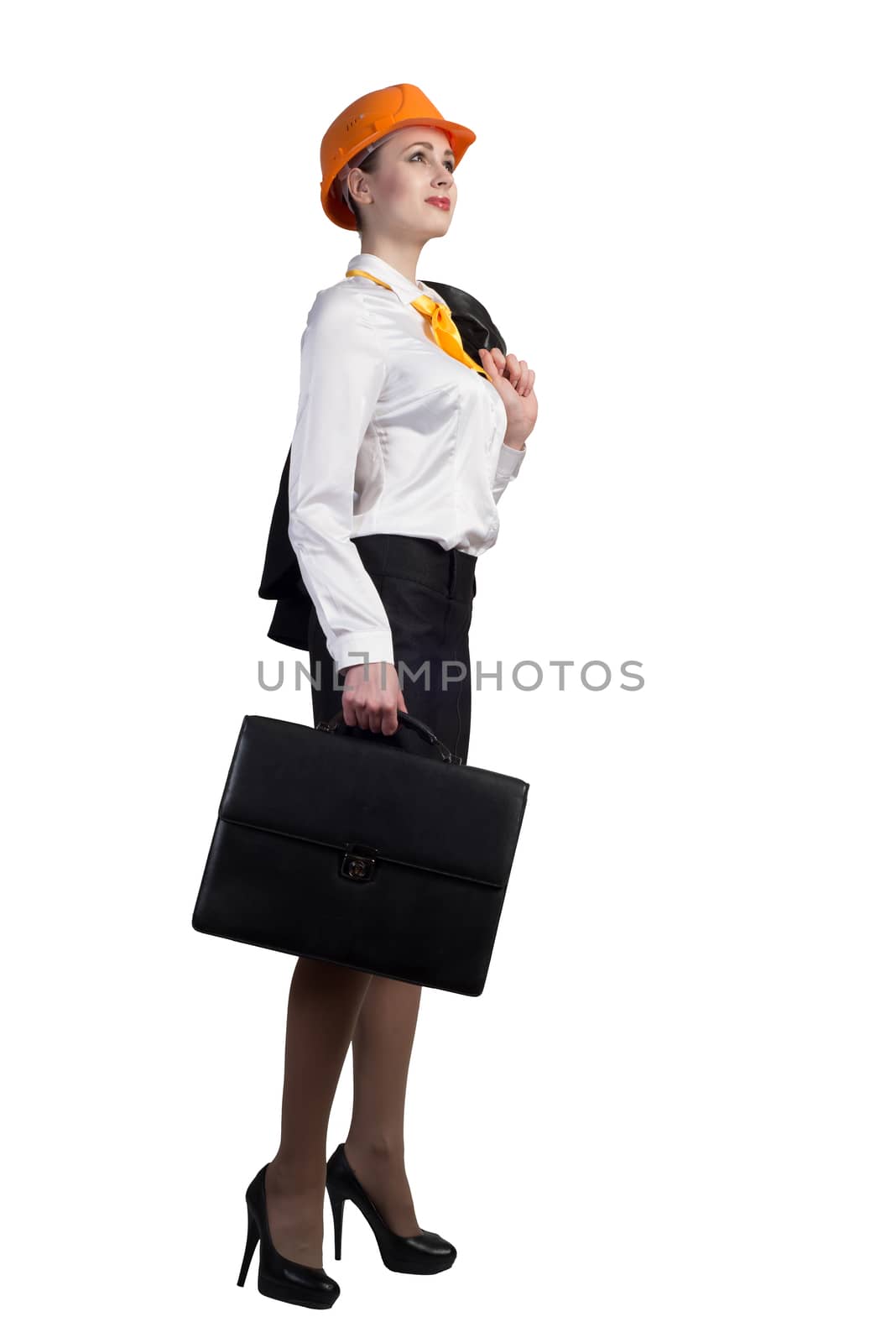 Young female engineer with suitcase in hardhat isolated on white