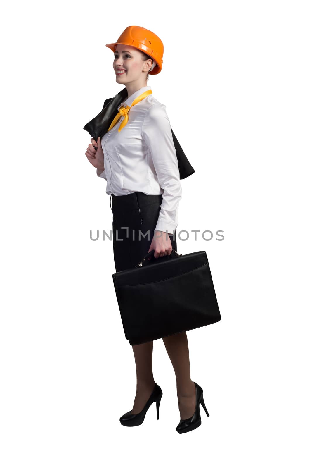 Young female engineer with suitcase in hardhat isolated on white