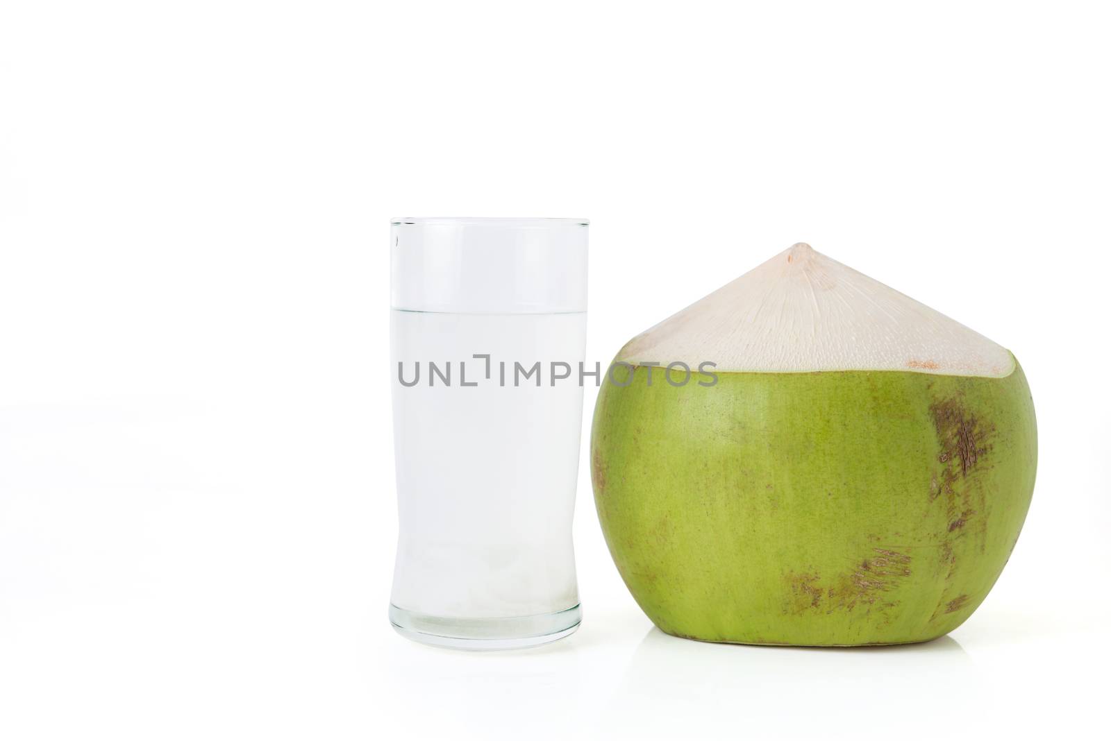 fresh coconut water in glass with coconut, clipping path