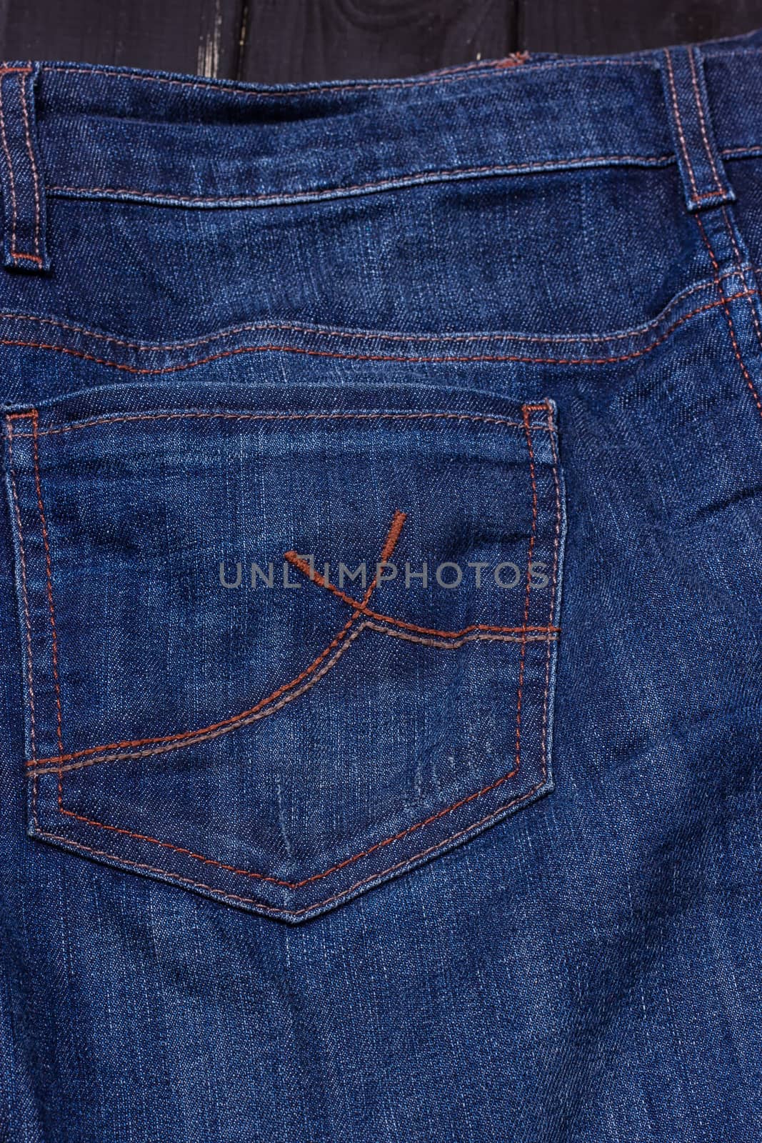 a pocket blue jeans. the denim texture