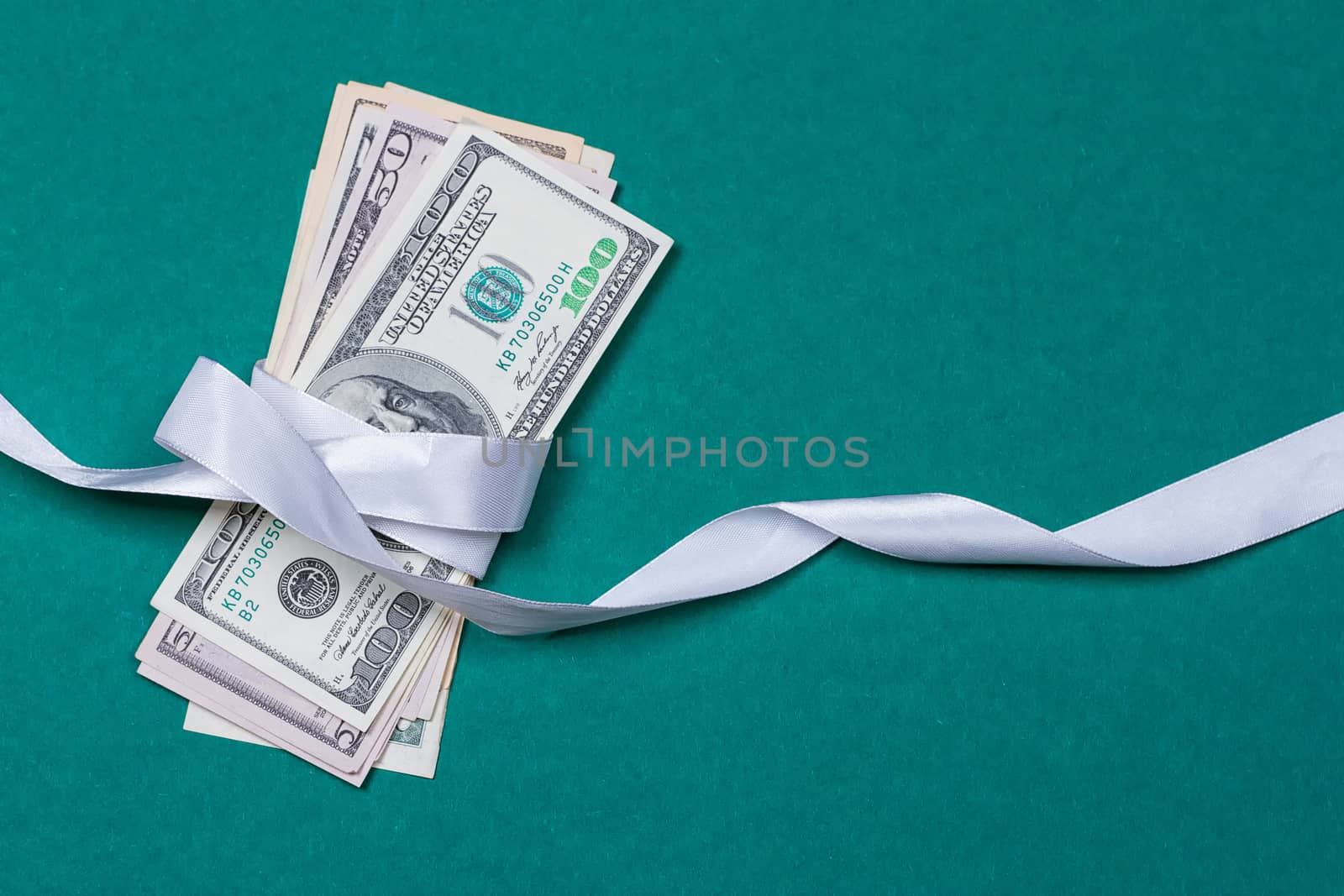 dollars in gift wrapping gift concept by victosha