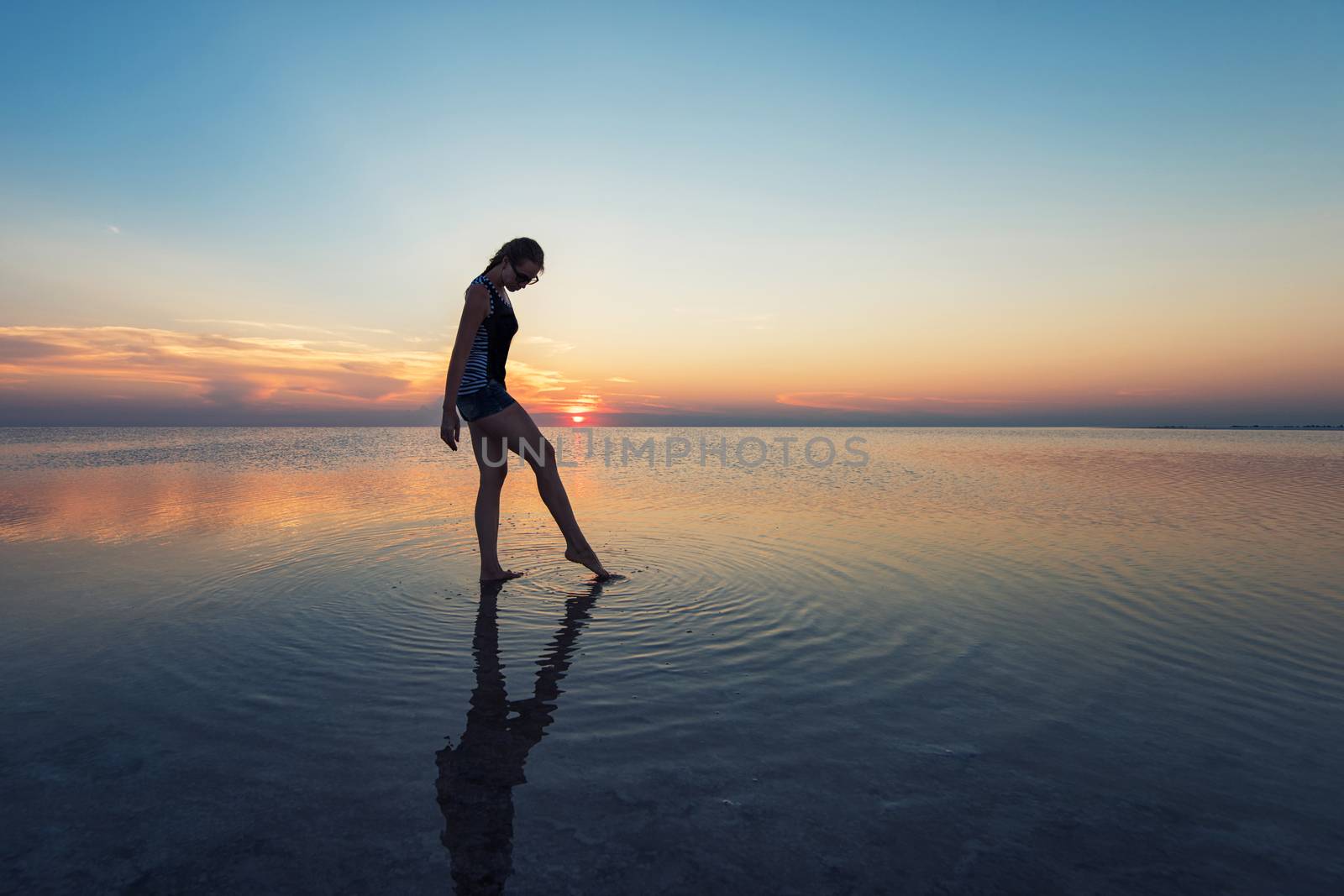 Beauty sunset on salty lake in Altay, Siberia, Russia