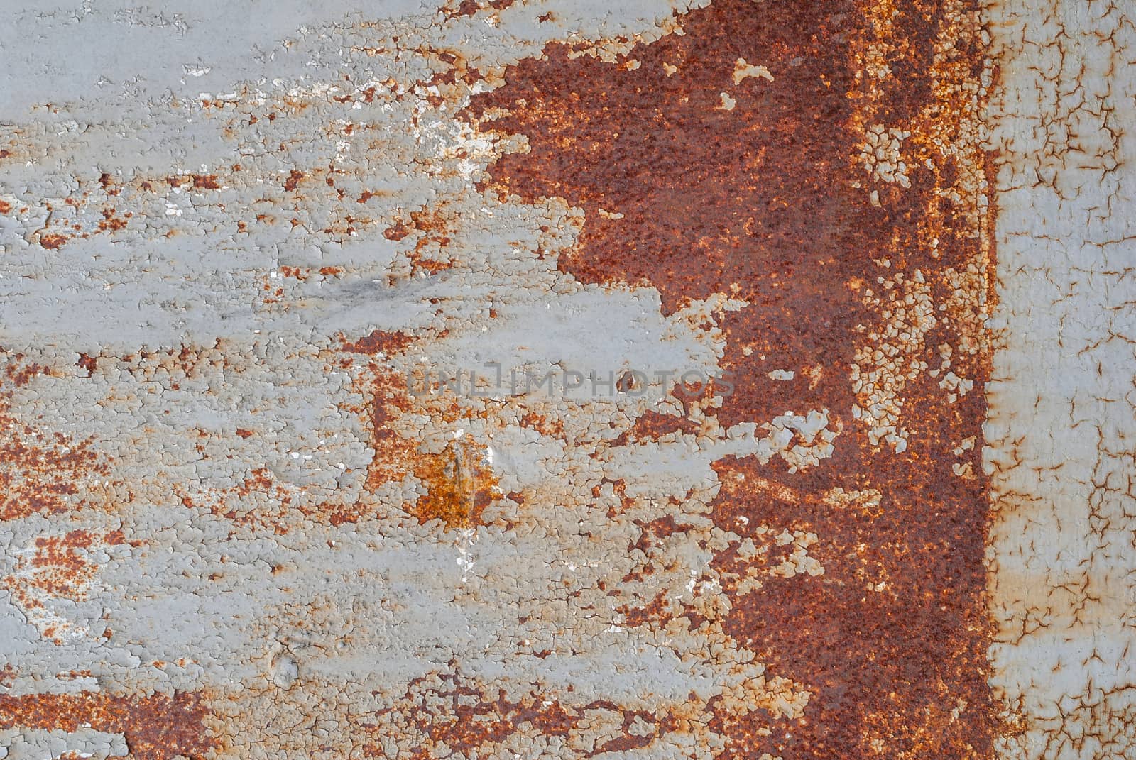 surface of rusty iron with remnants of old paint, texture background by uvisni
