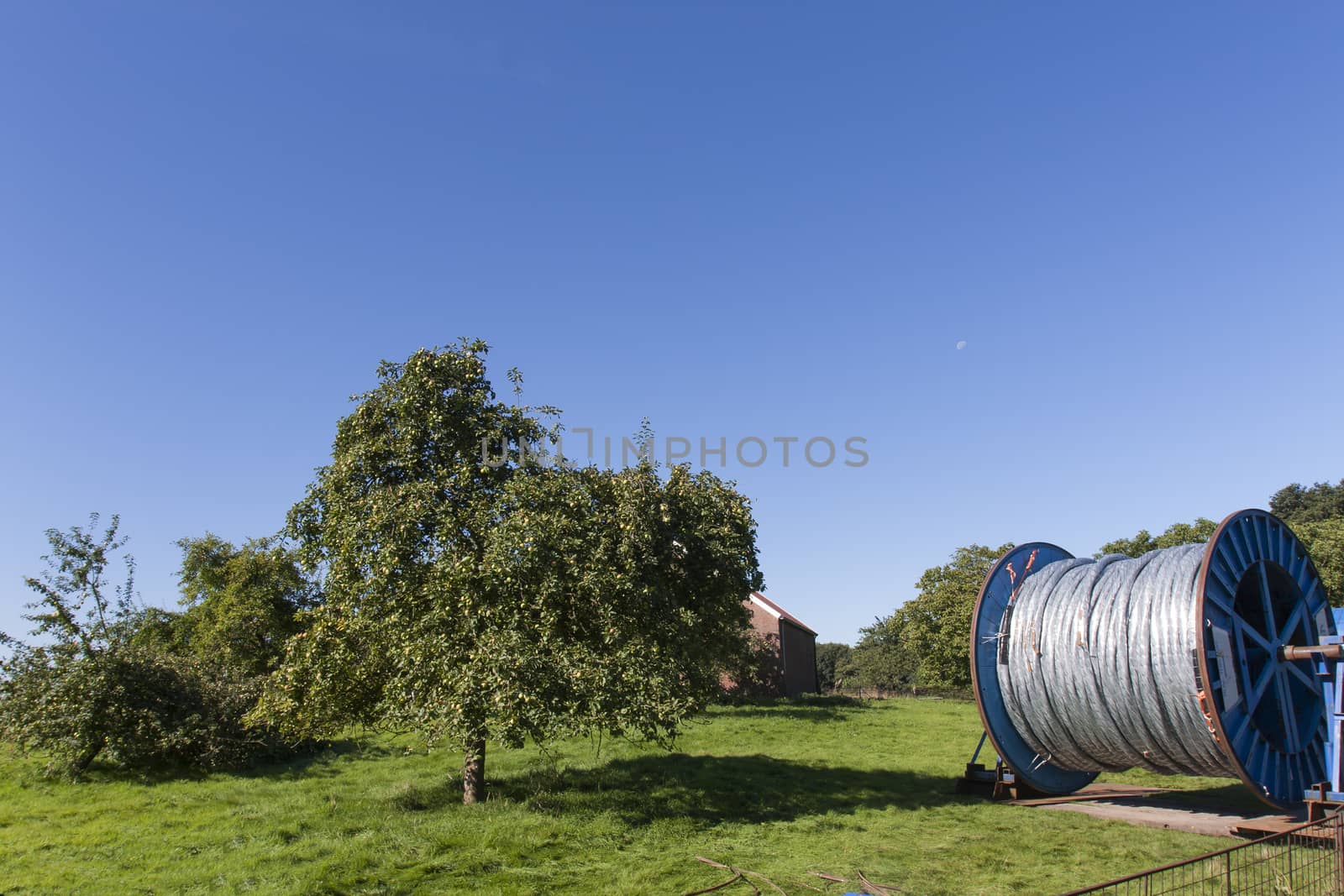 Big reel with cable in the countryside