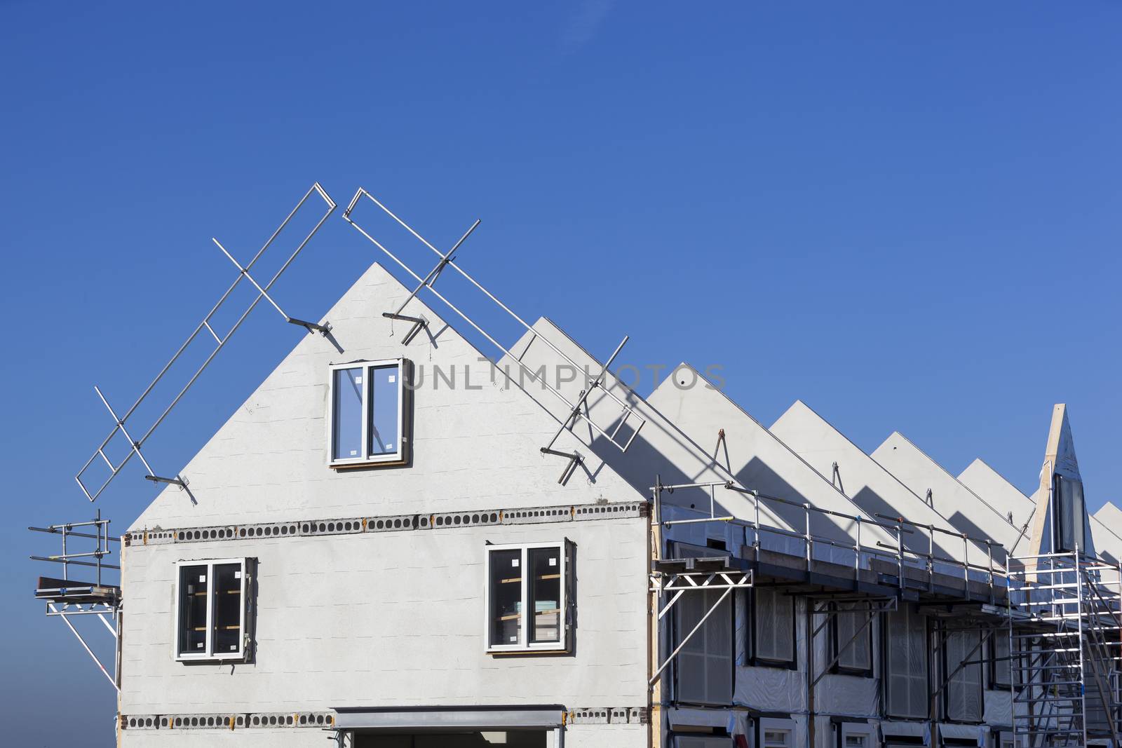 Construction site with houses with prefabricated walls in the Netherlands