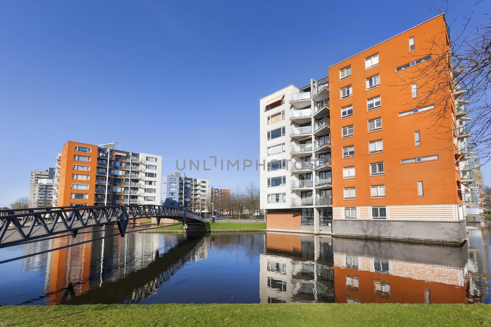 Apartment buildings and water in residential district Prinsenland in Rotterdam in the Netherlands