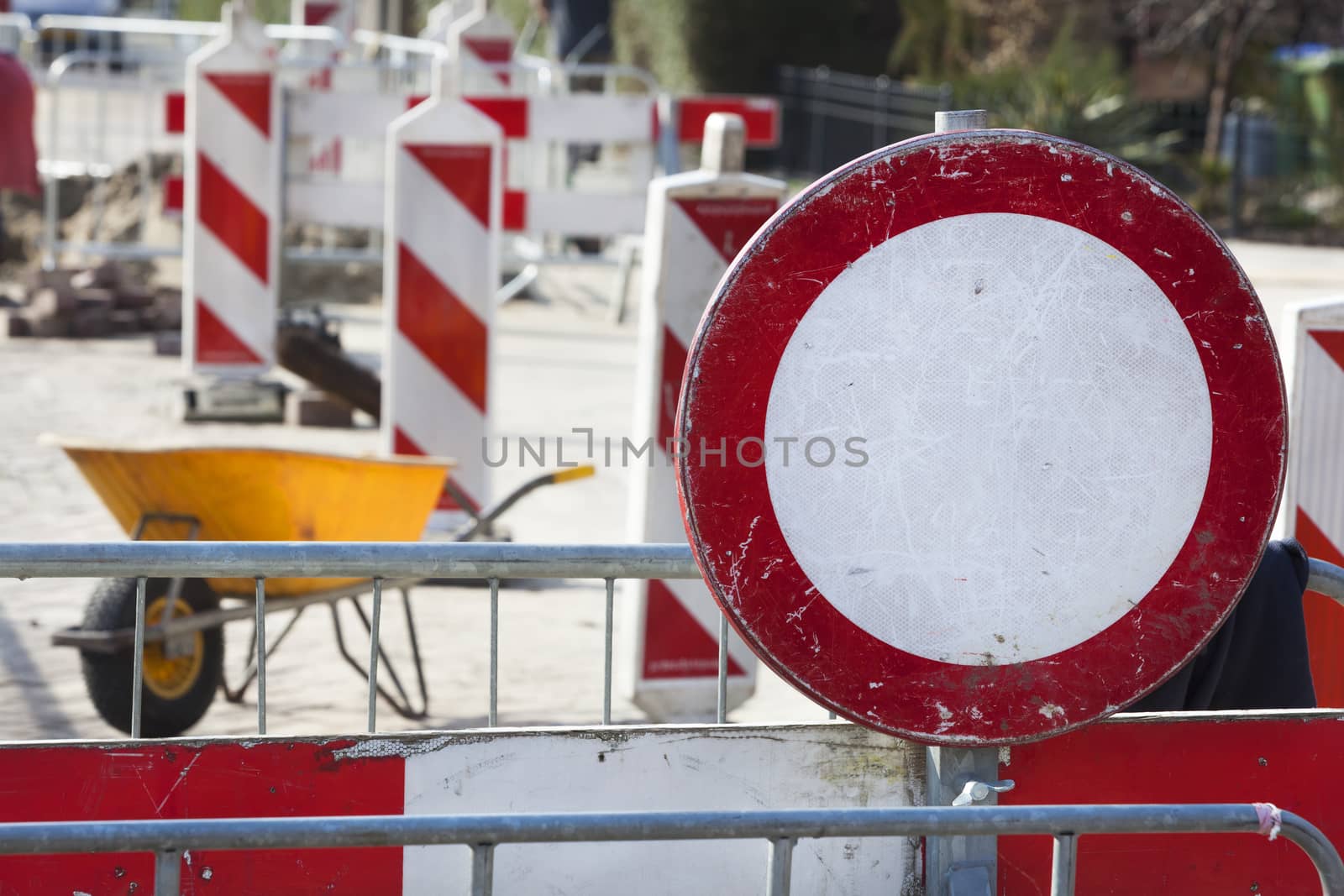 Road work and a no entrance sign