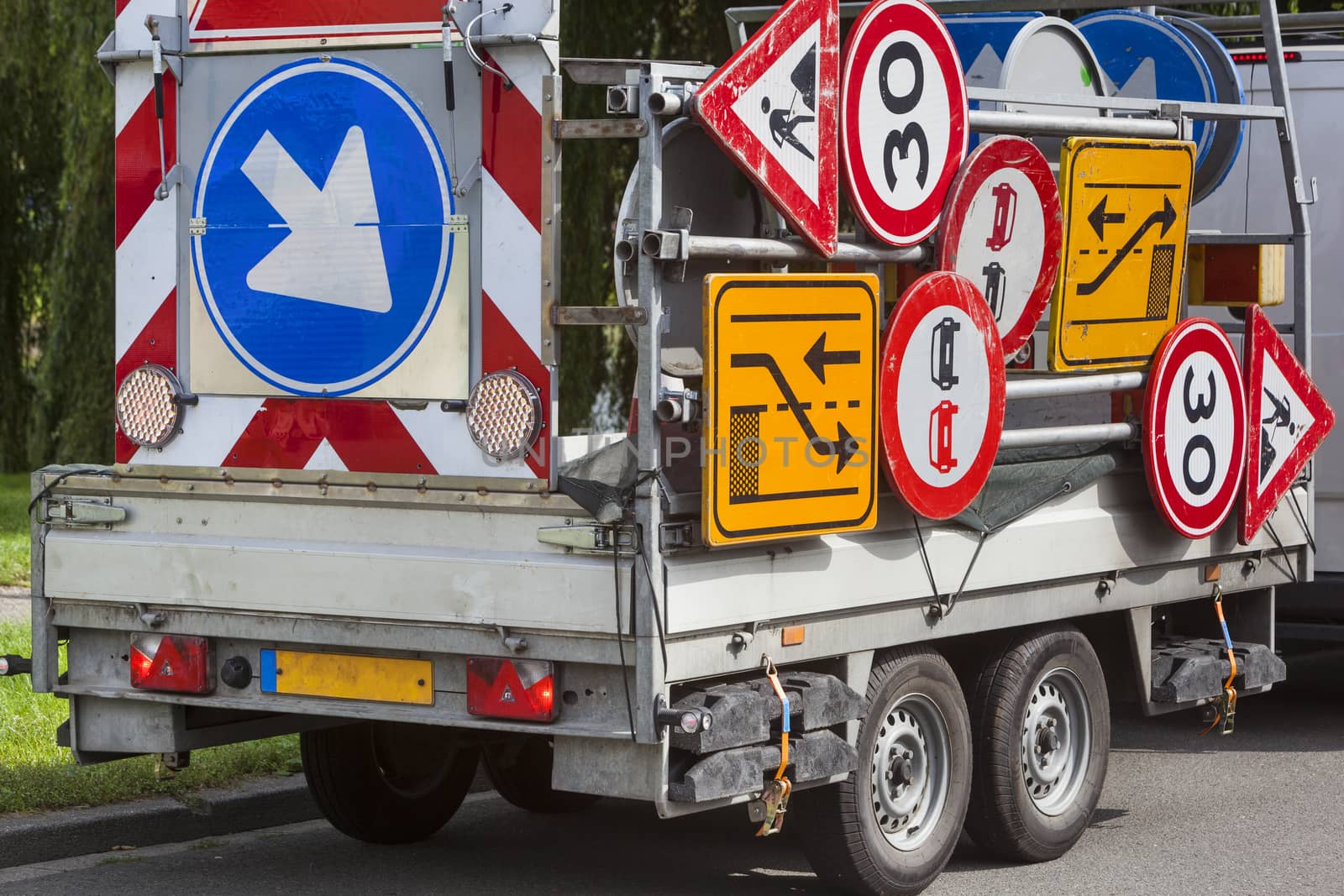 Confusing traffic signs on a trailer in the Netherlands