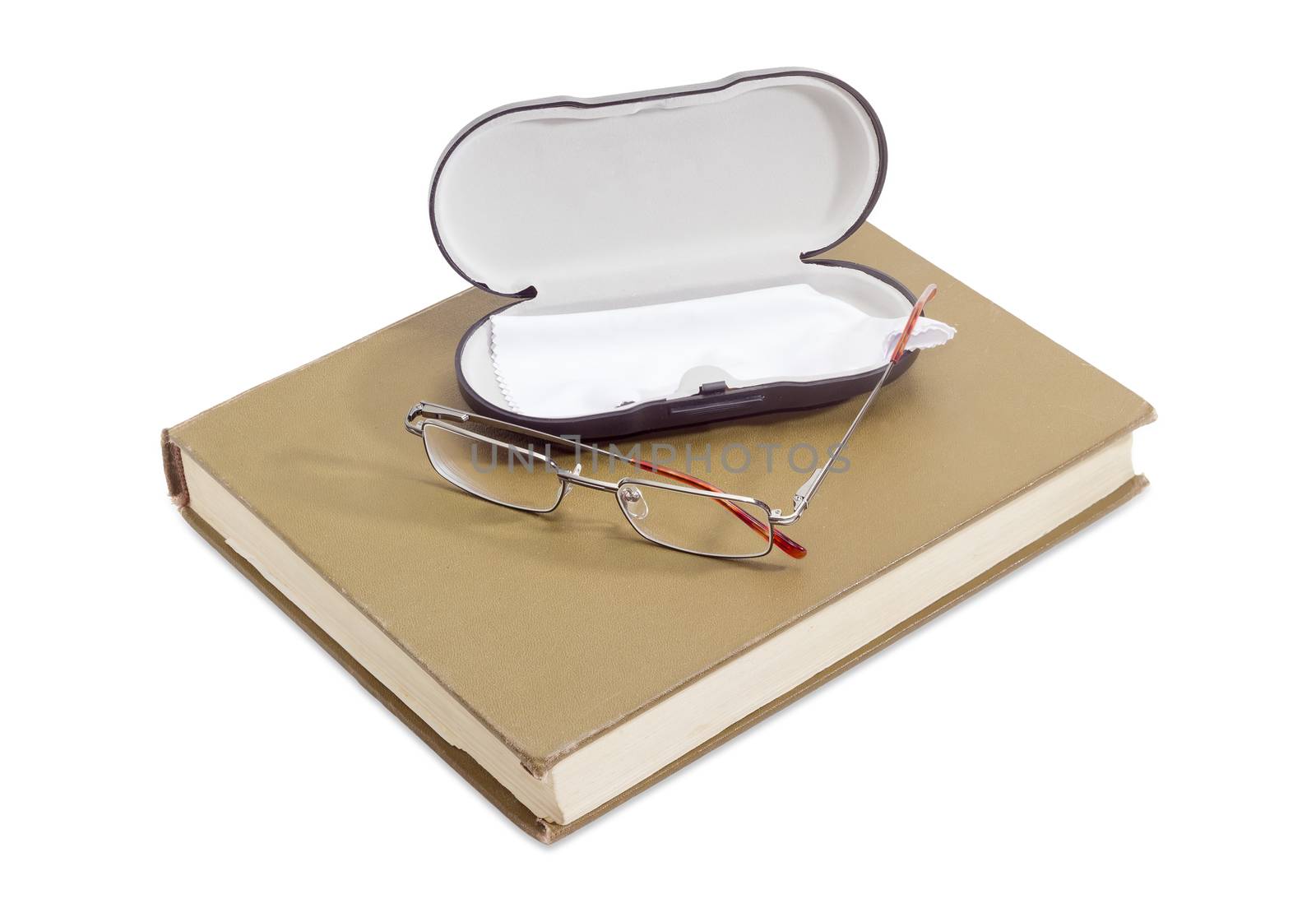 Modern classic men's eyeglasses and case on the book