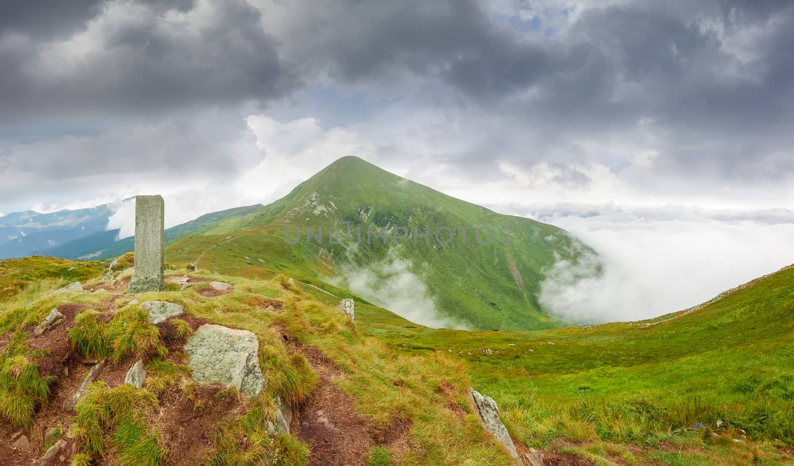 Mountain peak Hoverla in Carpathians in cloudy weather by anmbph